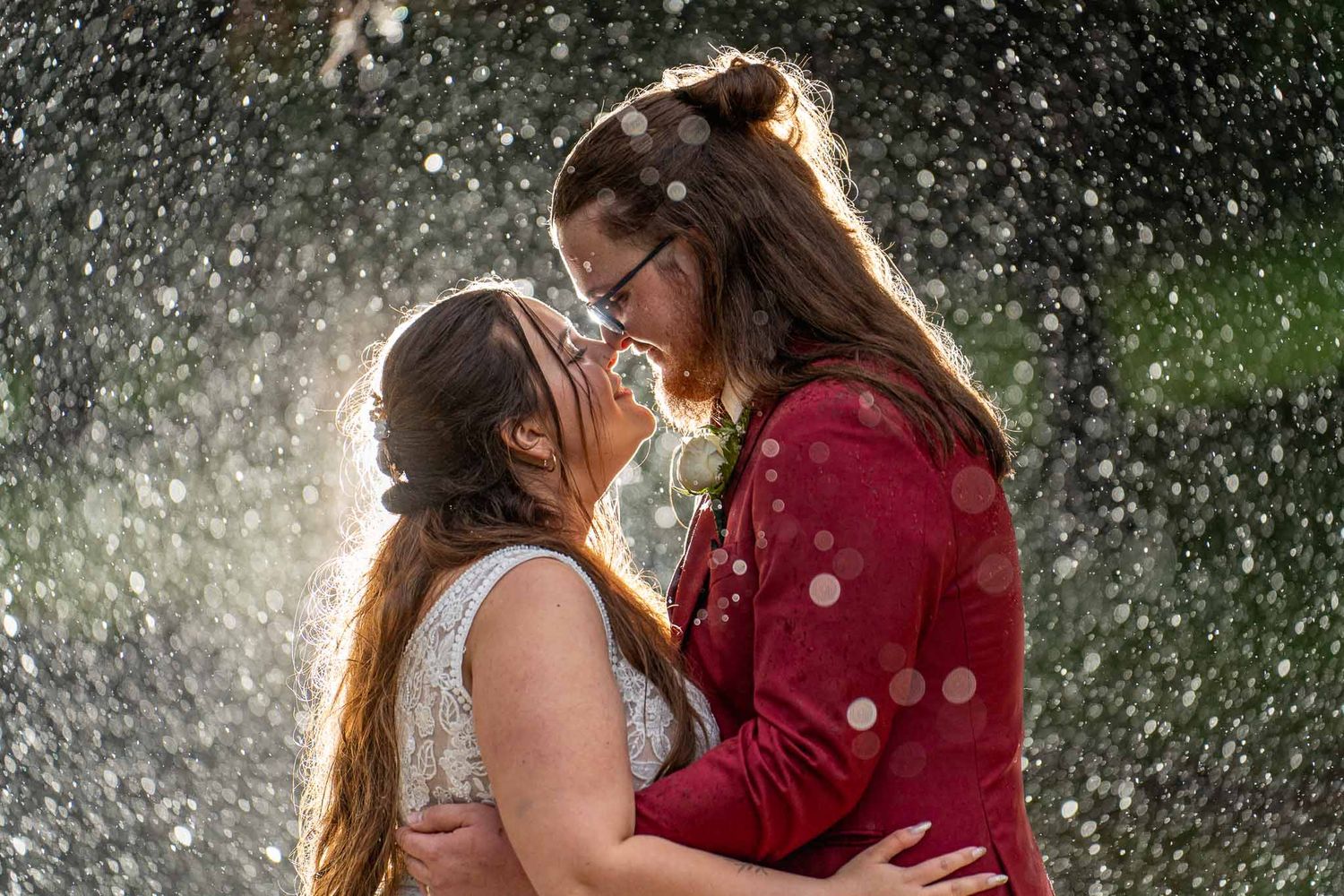Romantic couple photography sequence in falling snow or rain.