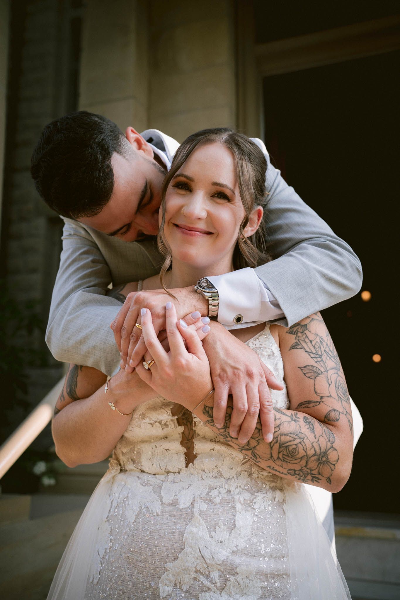 Close-up shots showing tender embraces and lace dress details.
