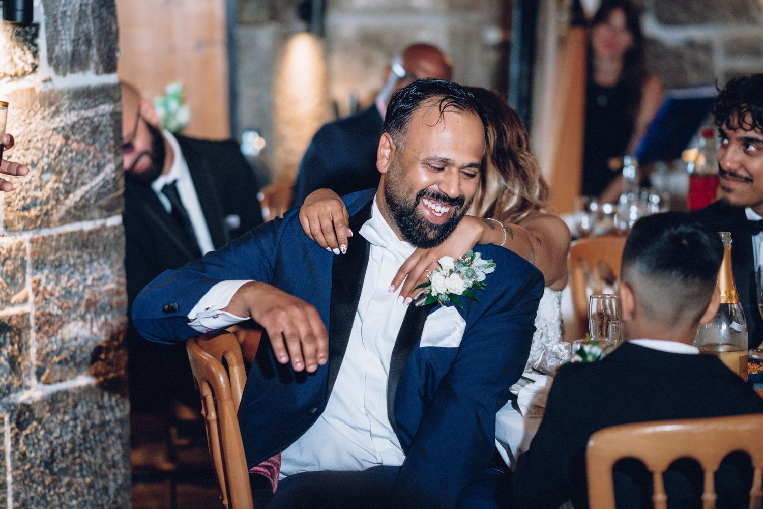 Wedding reception celebration with dancing and intimate moments.