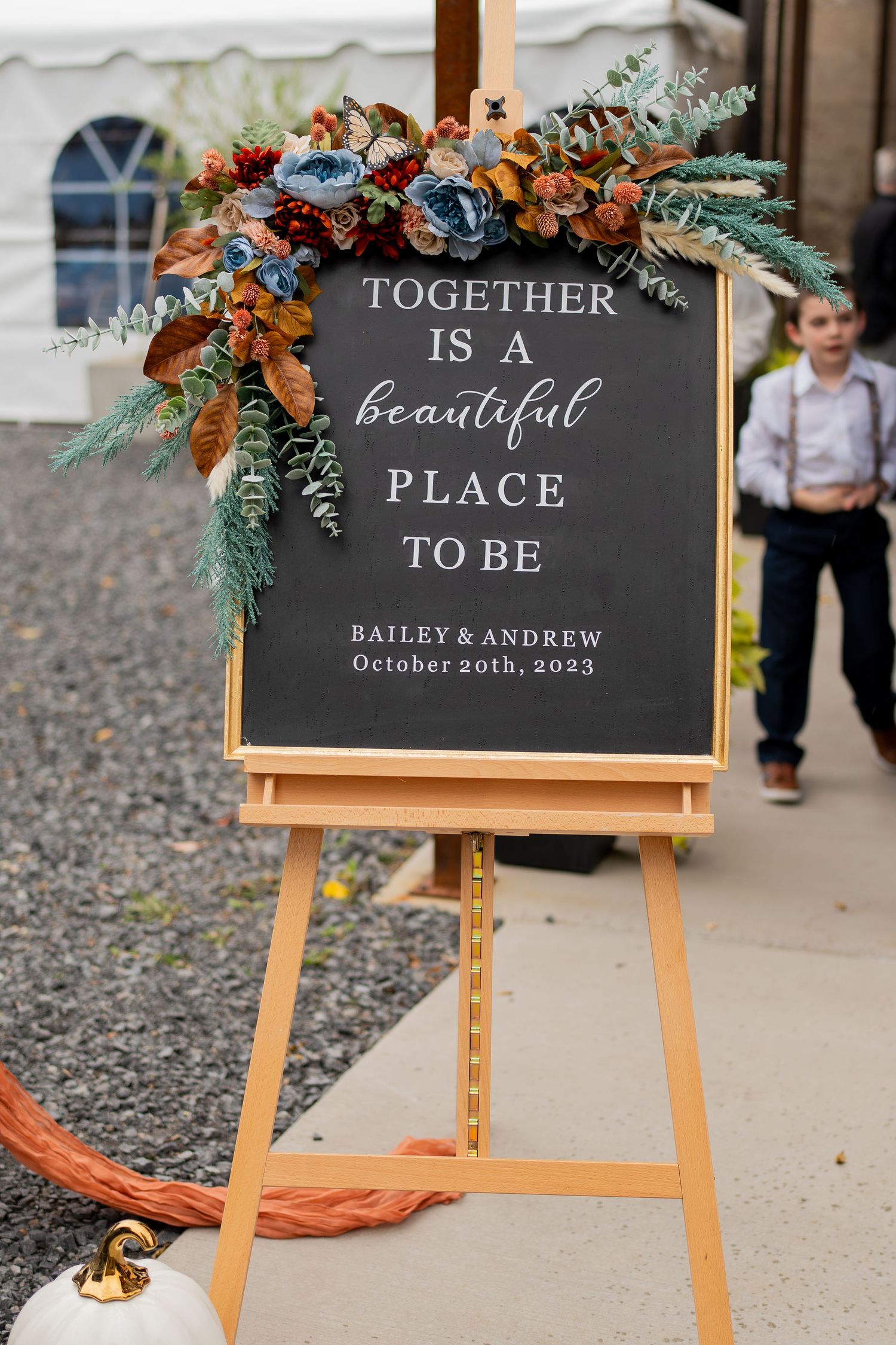 Wedding welcome sign for Bailey and Andrew, October 20th 2023, with fall floral decor.