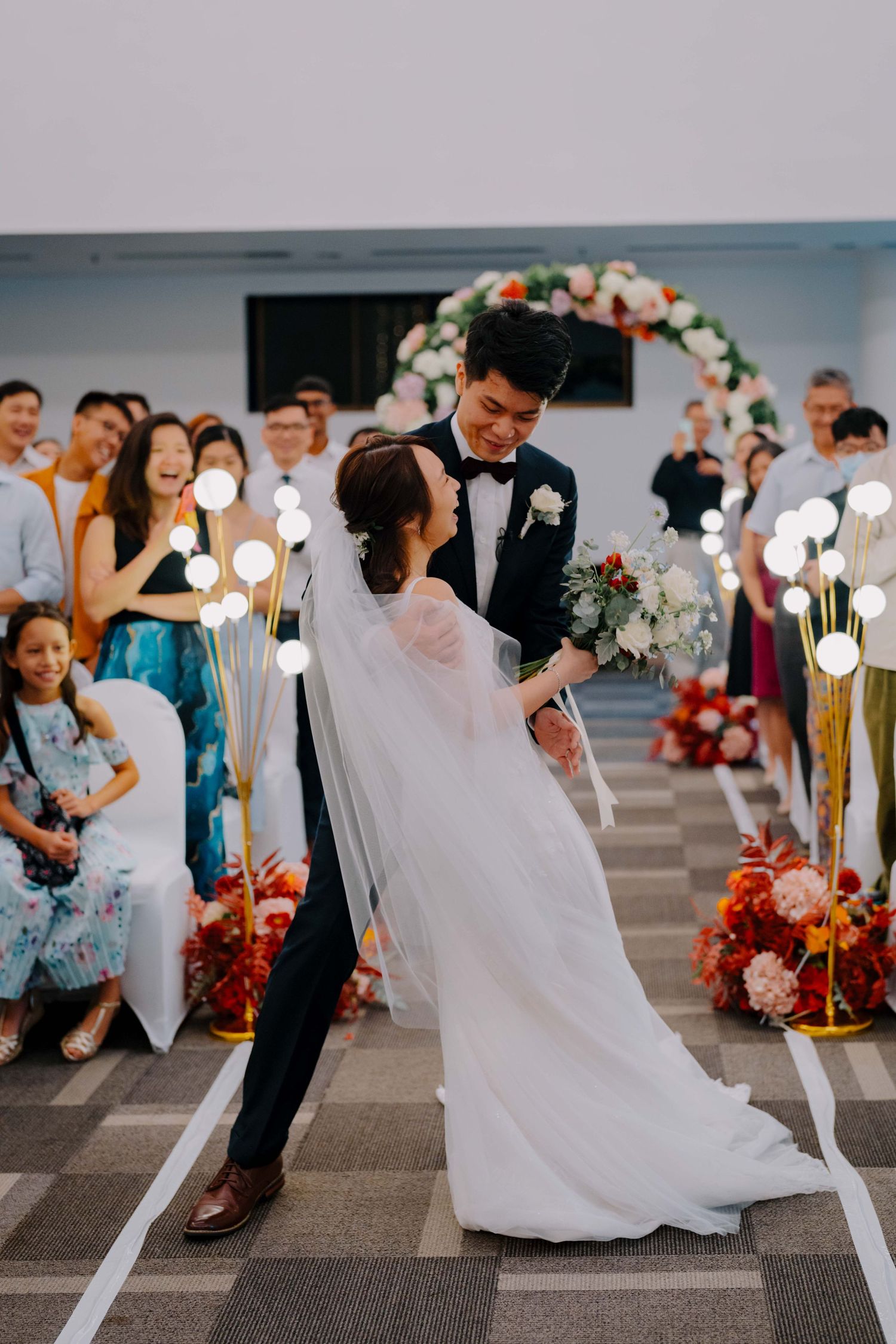 bride and groom marches in as newlyweds