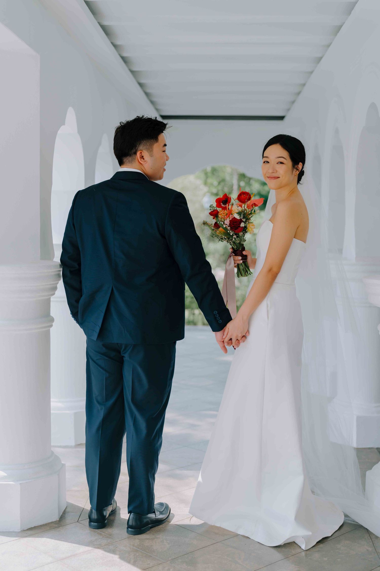 bride and groom in gown and suit at gallop extension botanic gardens singapore