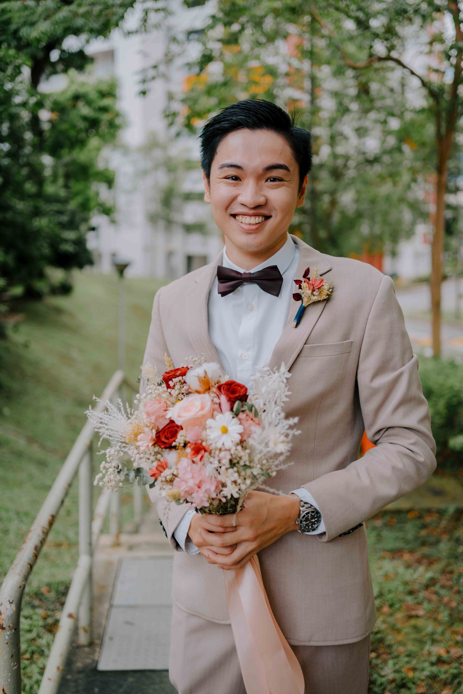 groom on wedding day at sofitel singapore hotel