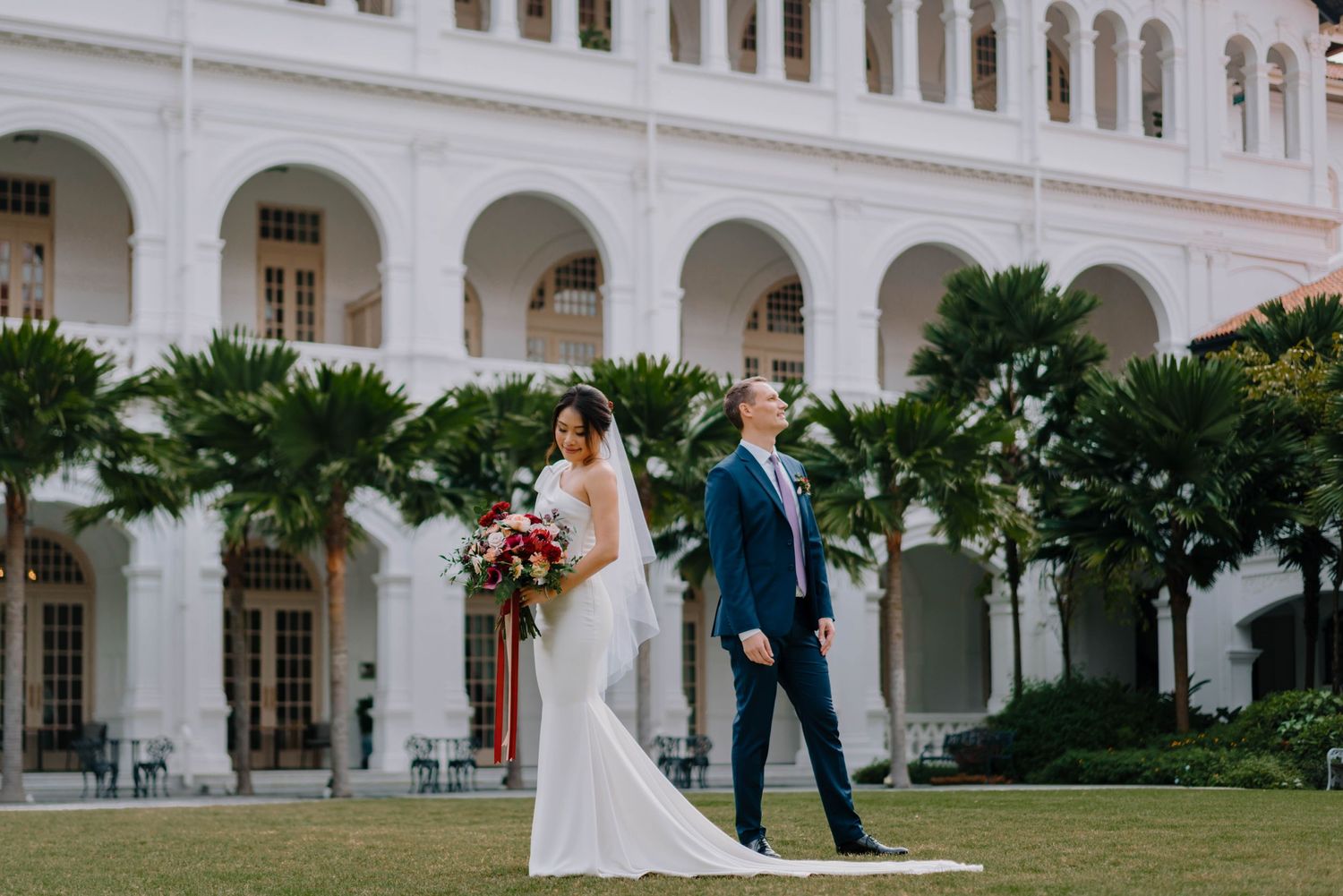 intimate wedding photography at raffles hotel by a documentary-style wedding photographer