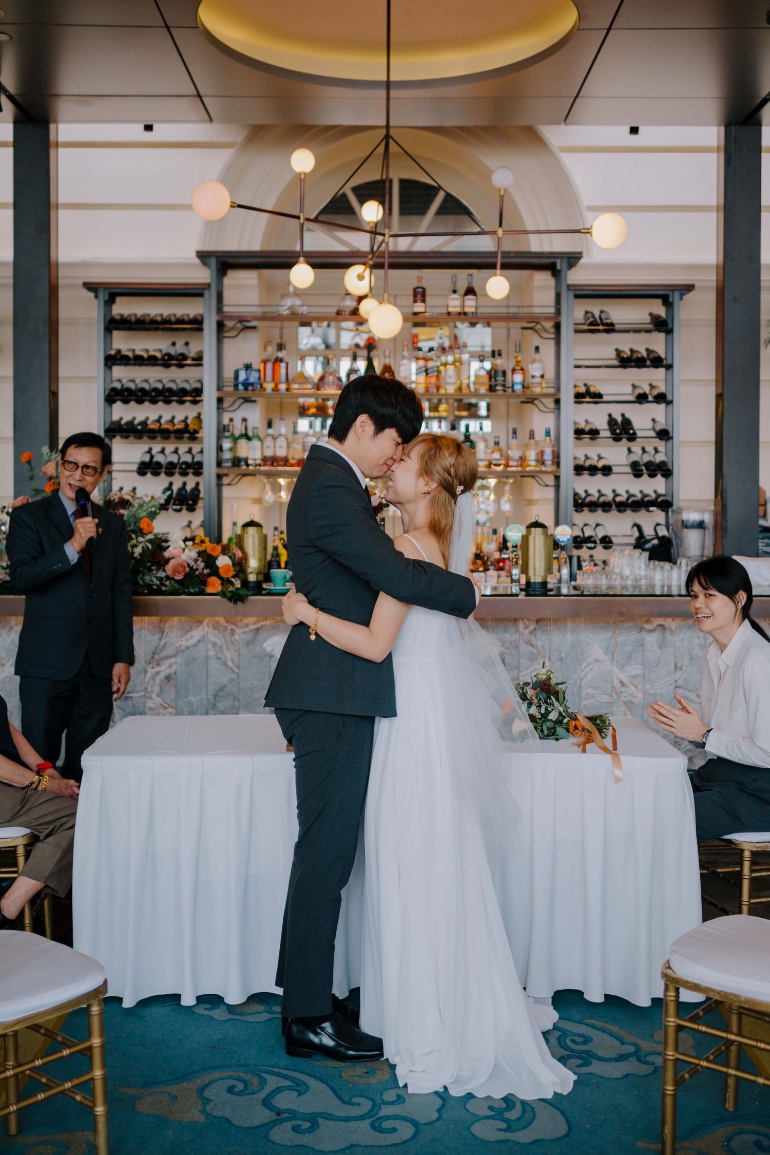 bride and groom kiss as newlyweds in empress wedding