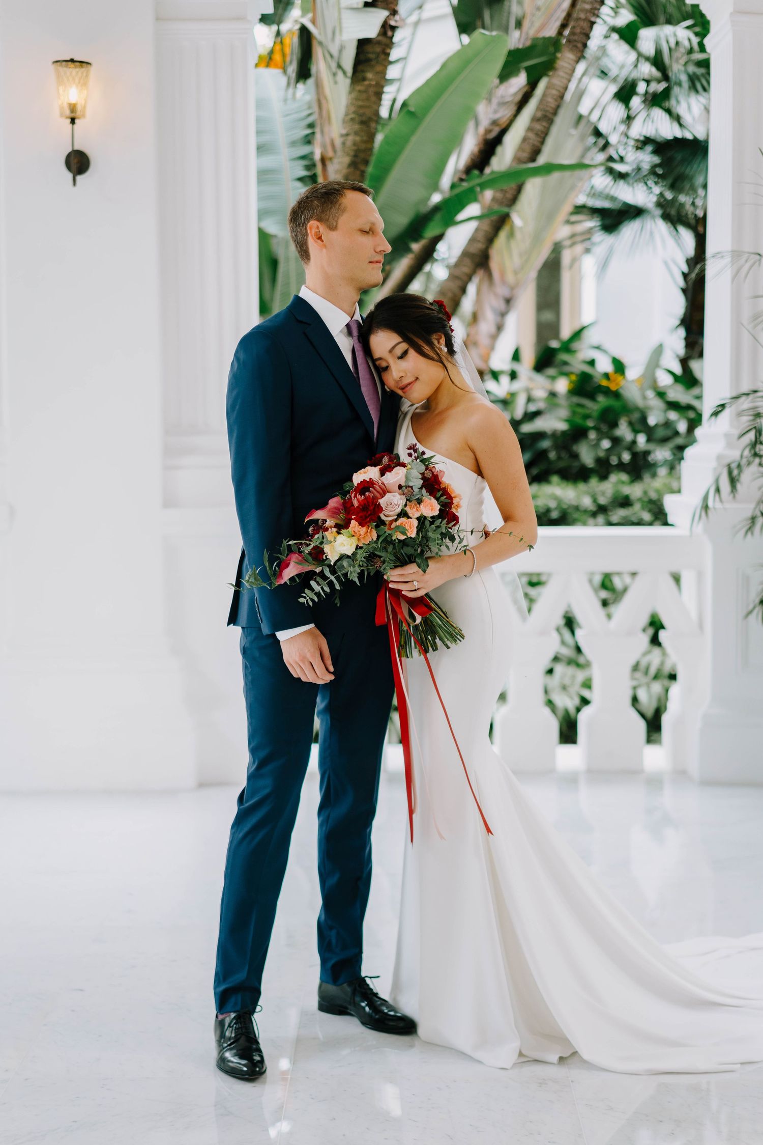 intimate and candid wedding photography at raffles hotel by a documentary-style wedding photographer