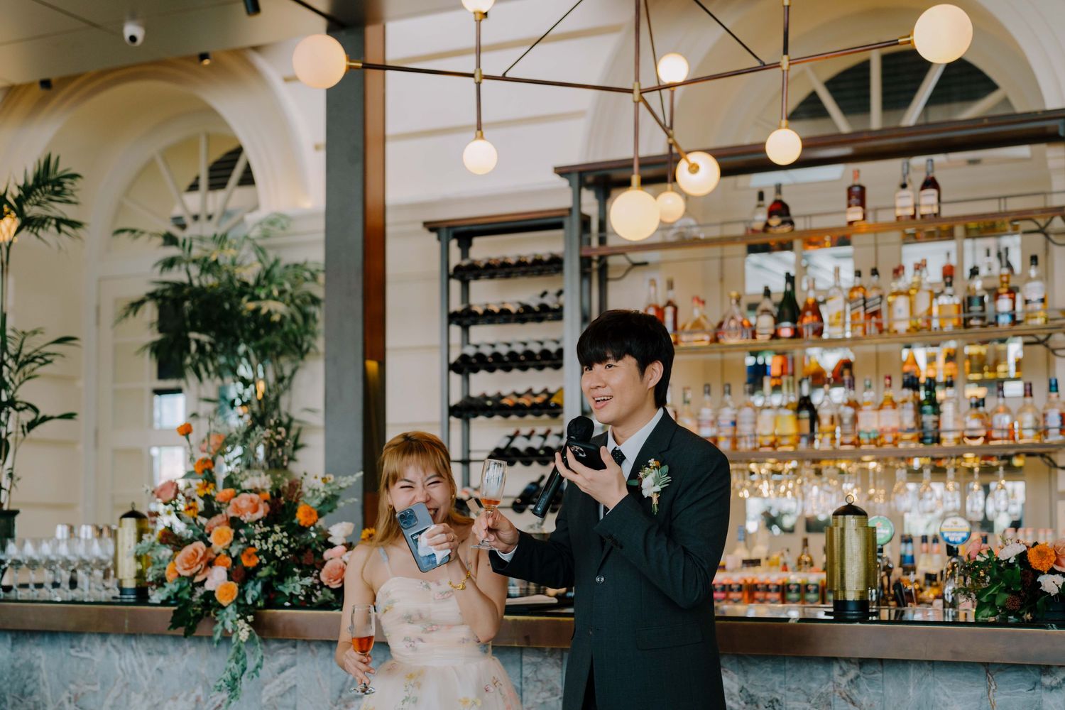 bride and groom toast to their guests