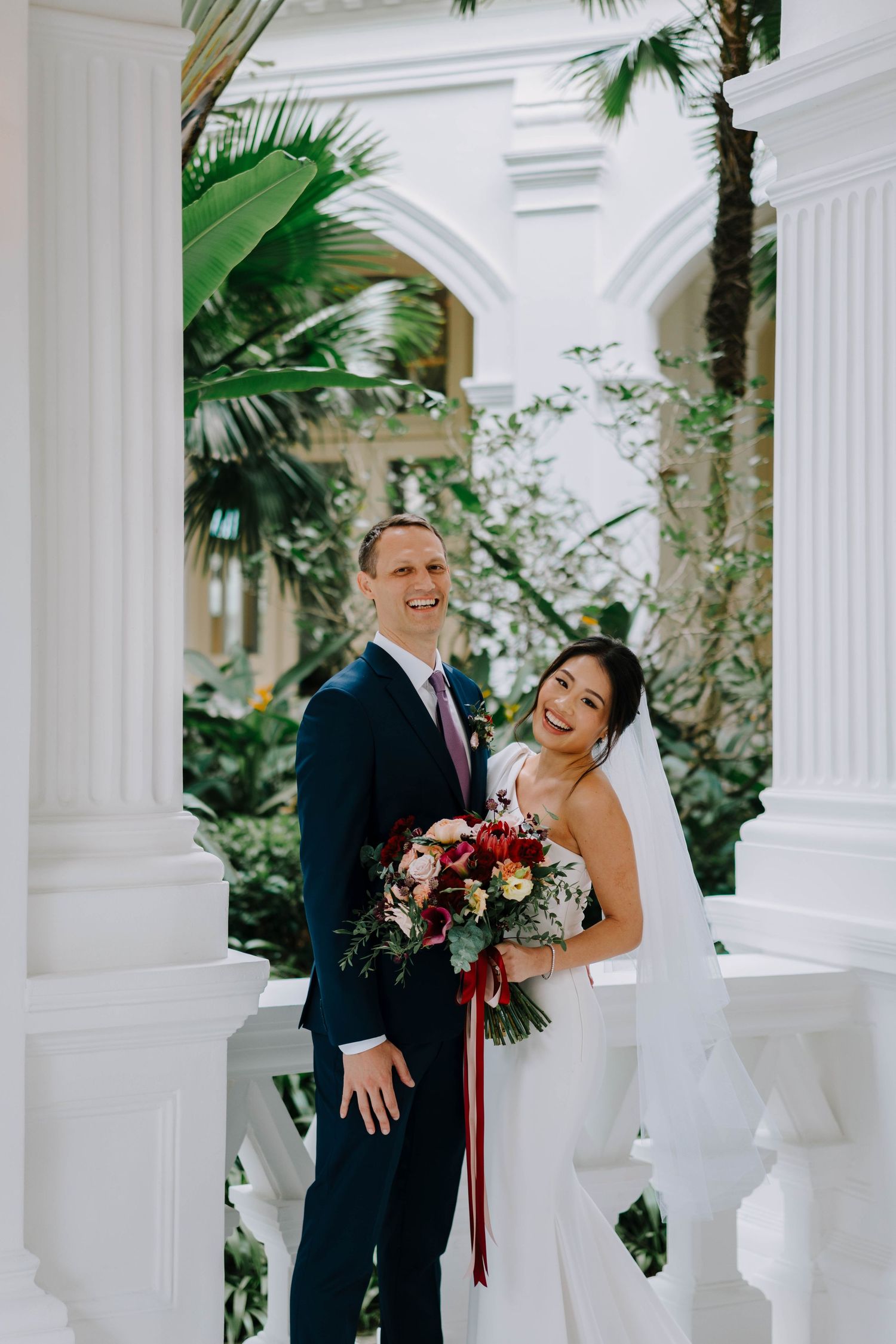 intimate wedding photography at raffles hotel by a documentary-style wedding photographer