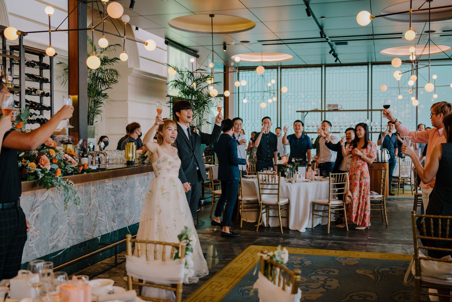 newlywed toast to their guests on wedding day