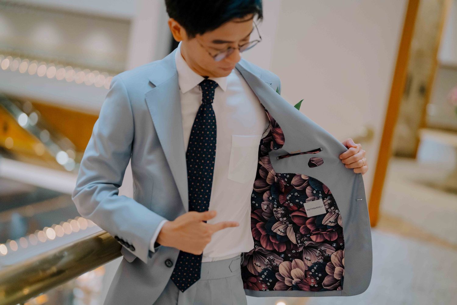 bespoke groom suit on wedding day conrad singapore orchard hotel