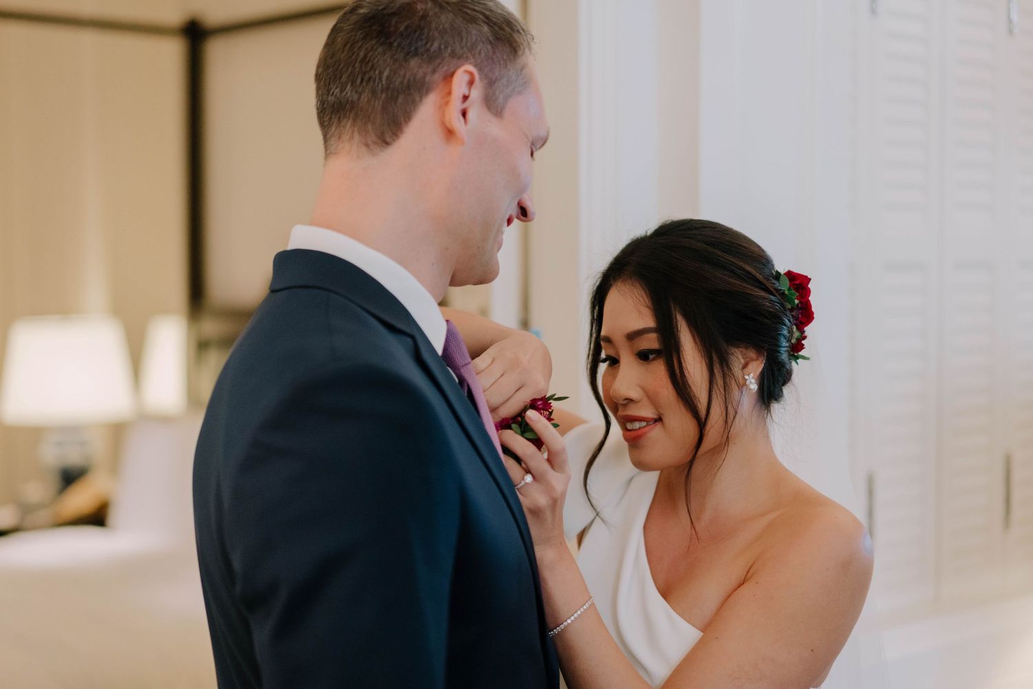 intimate and candid wedding photography at raffles hotel by a documentary-style wedding photographer
