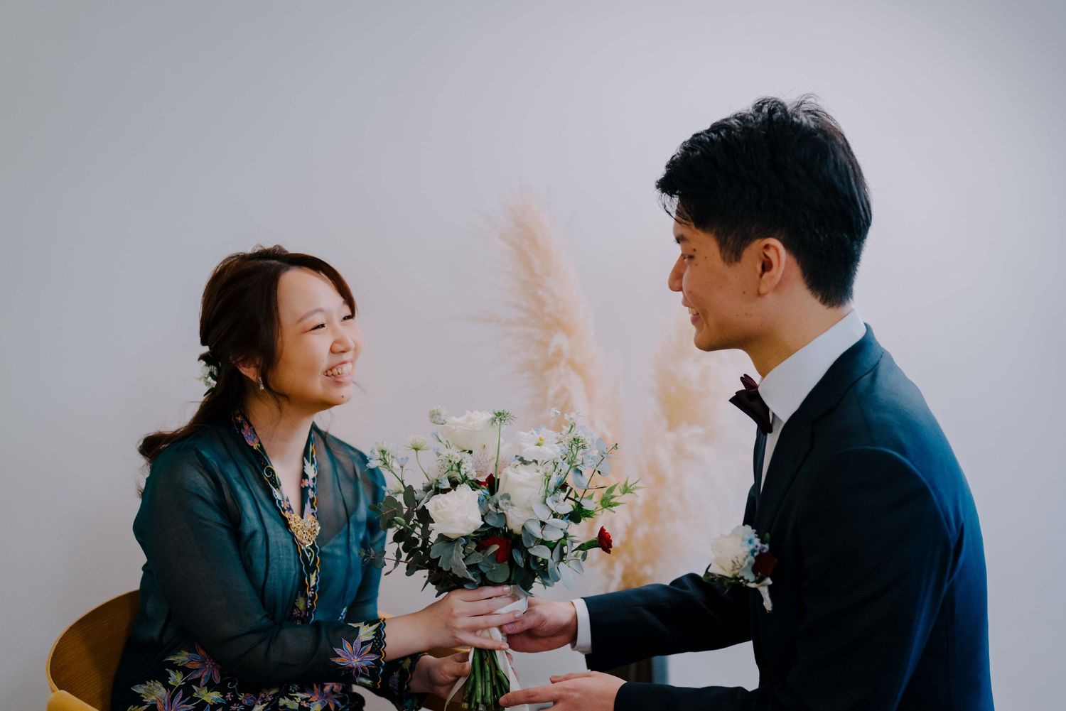 emotional moment at ywca fort canning hotel where groom meets bride photographed by korean wedding photographer in singapore