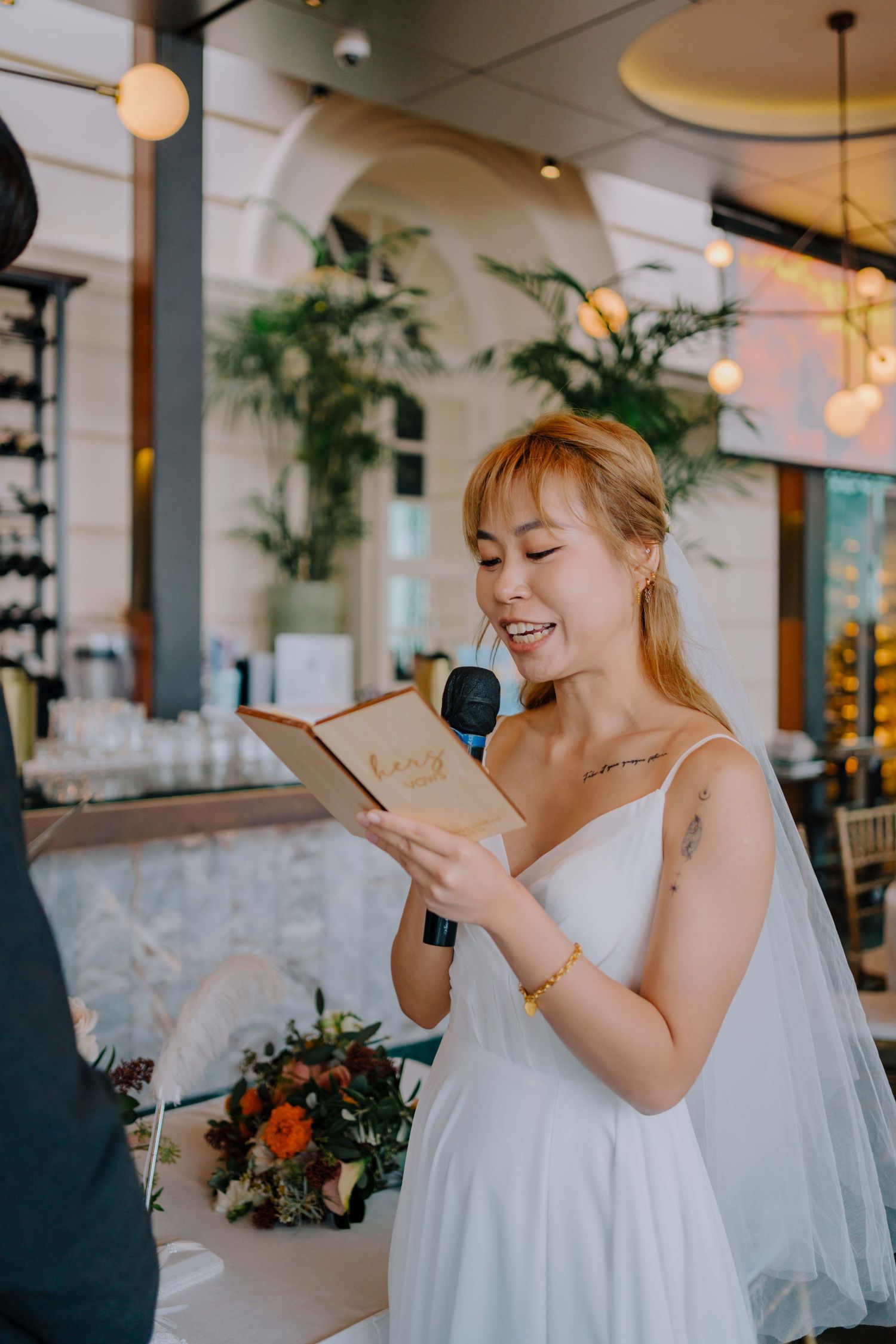 bride reads vows to groom on wedding day