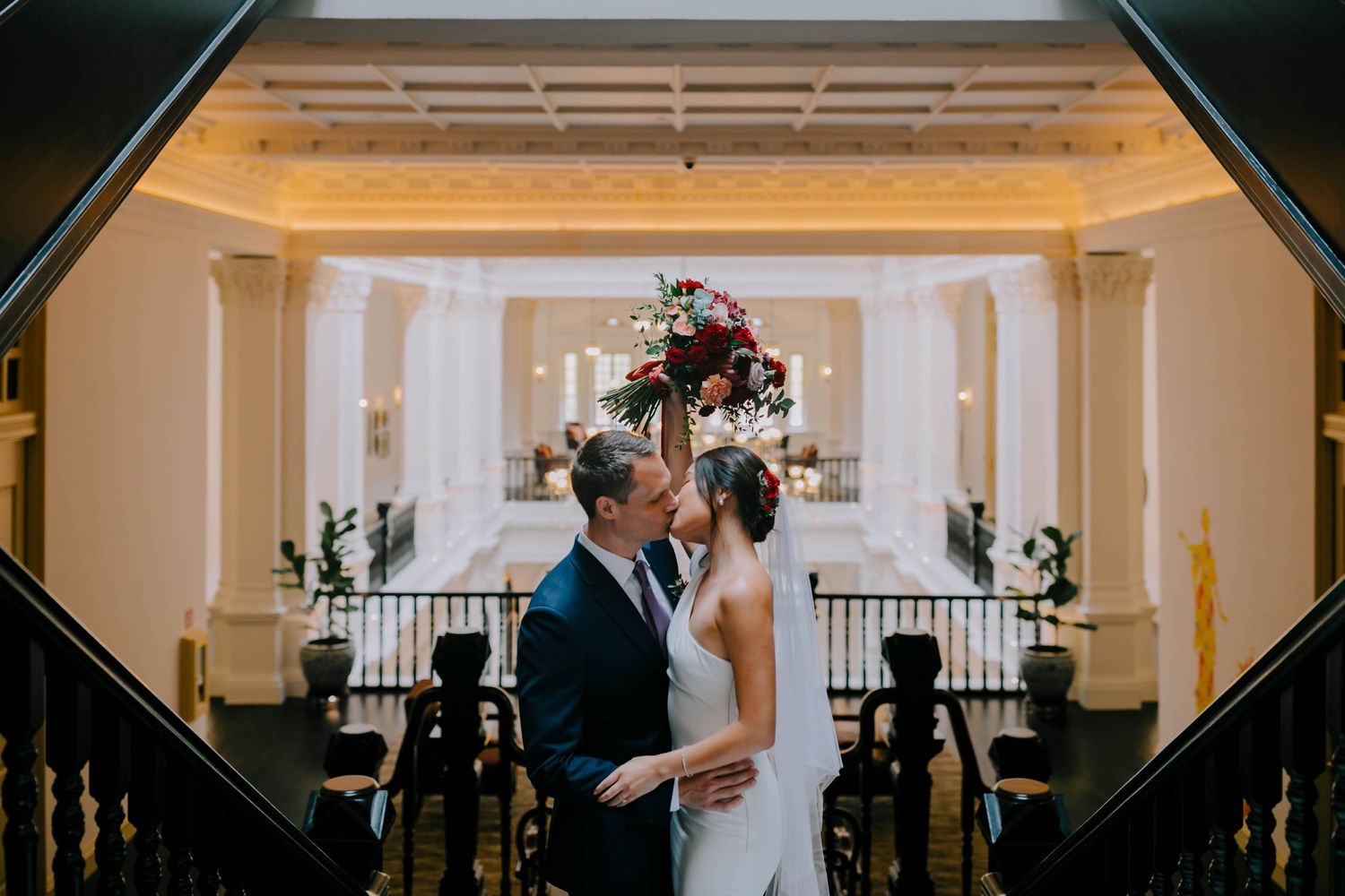 luxury wedding photography at raffles hotel by a documentary-style wedding photographer