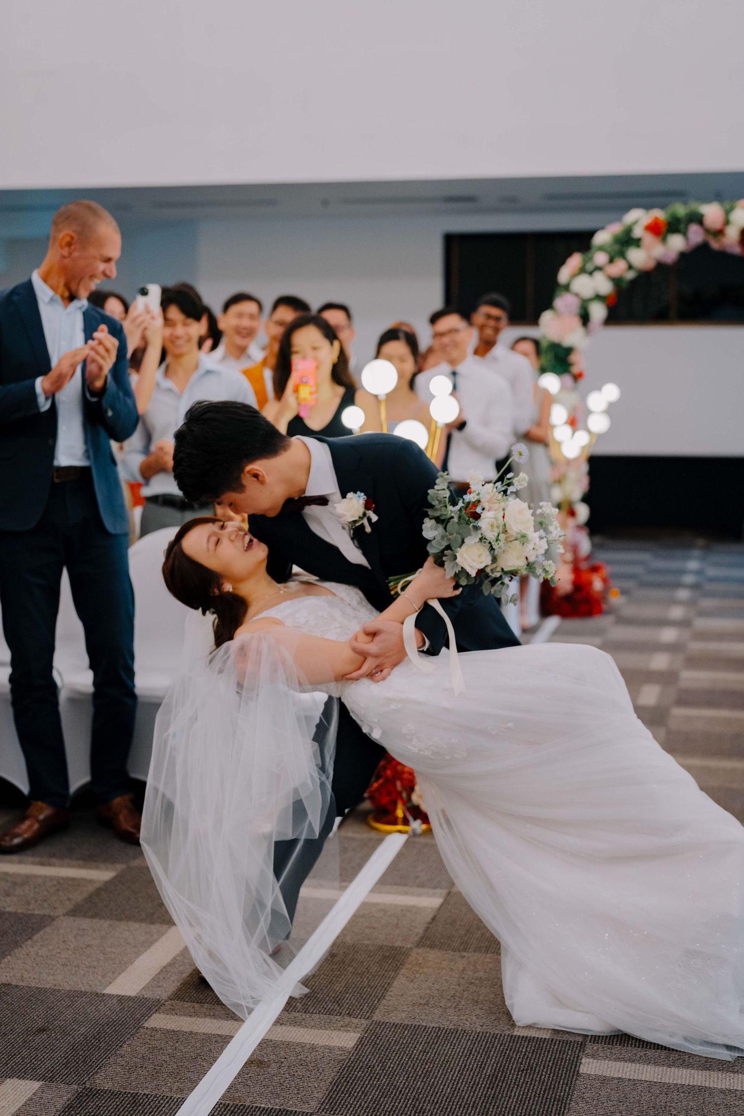 bride and groom marches in as newlyweds