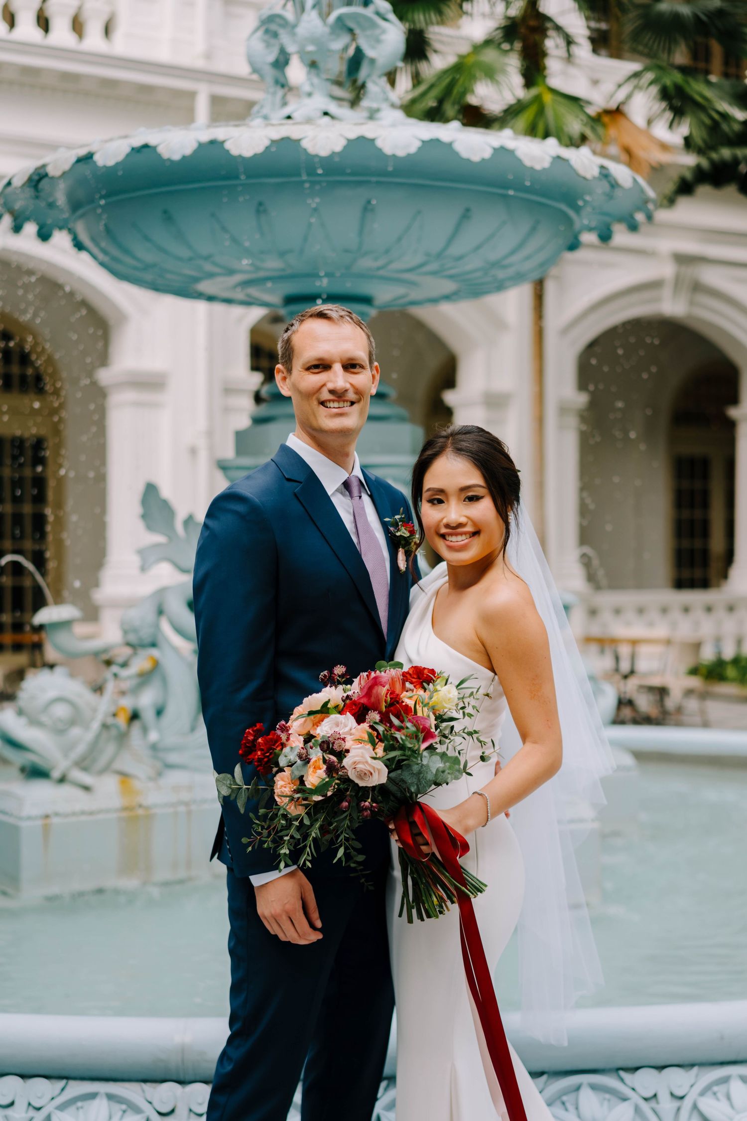luxury wedding photography at raffles hotel by a documentary-style wedding photographer