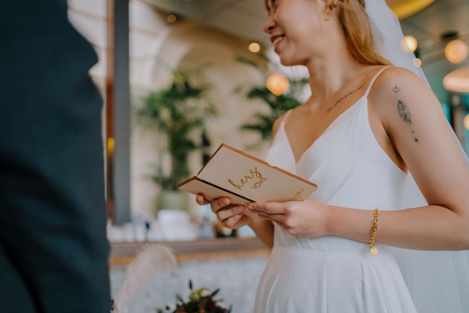 bride reading vows to groom at wedding