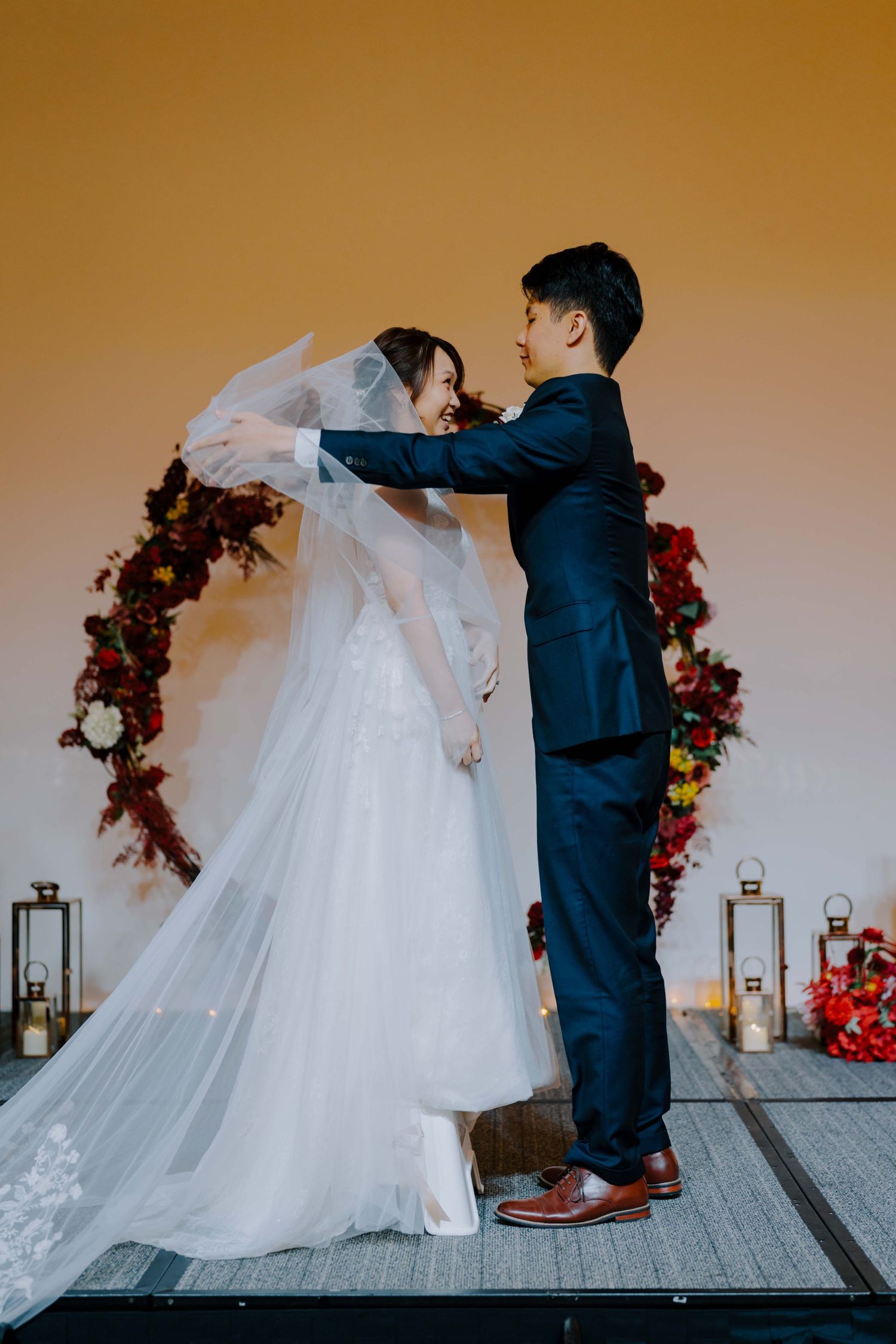 the anticipated moment at ywca fort canning hotel where bride and groom kiss photographed by korean wedding photographer in singapore