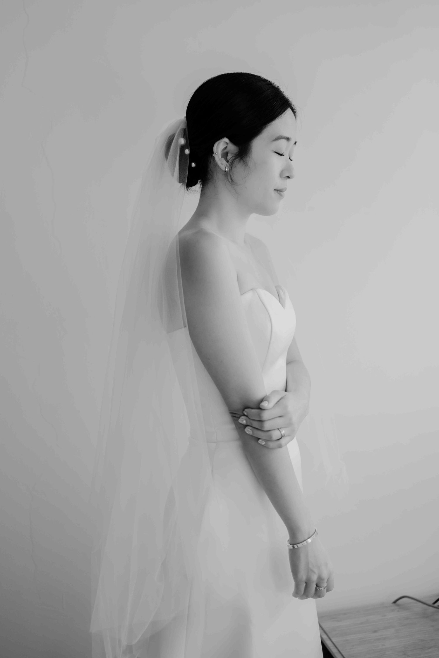 black and white photo of a bride ready in a gown