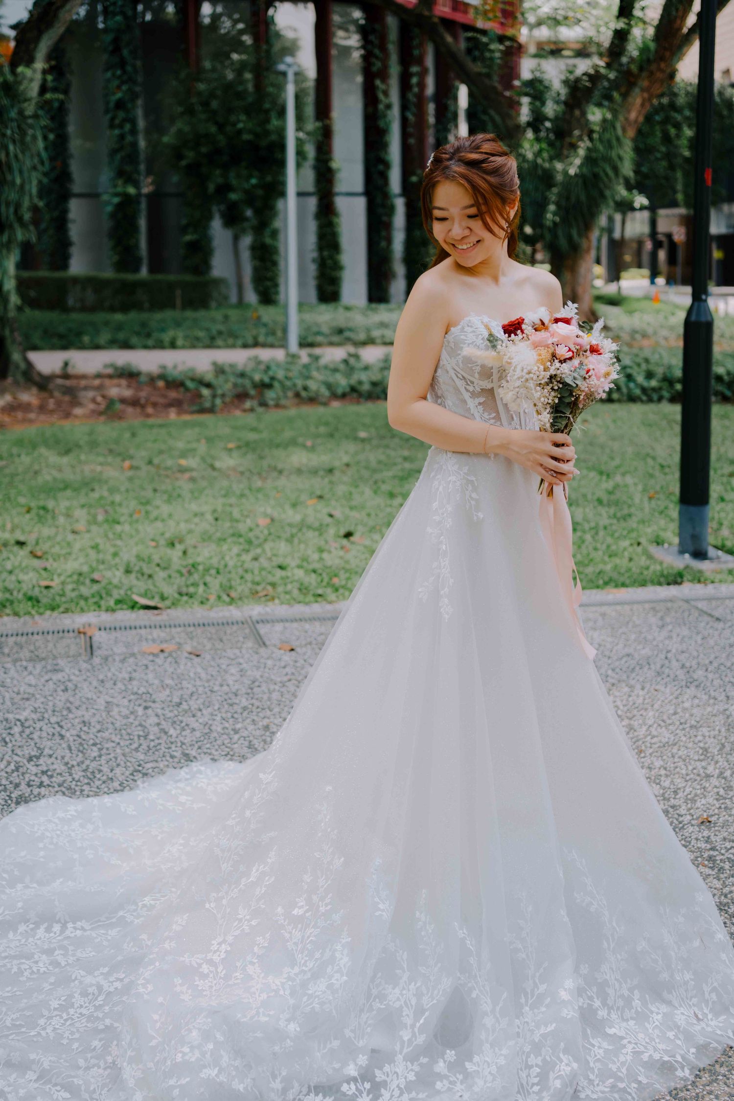 bridal gown with long train at sofitel singapore wedding