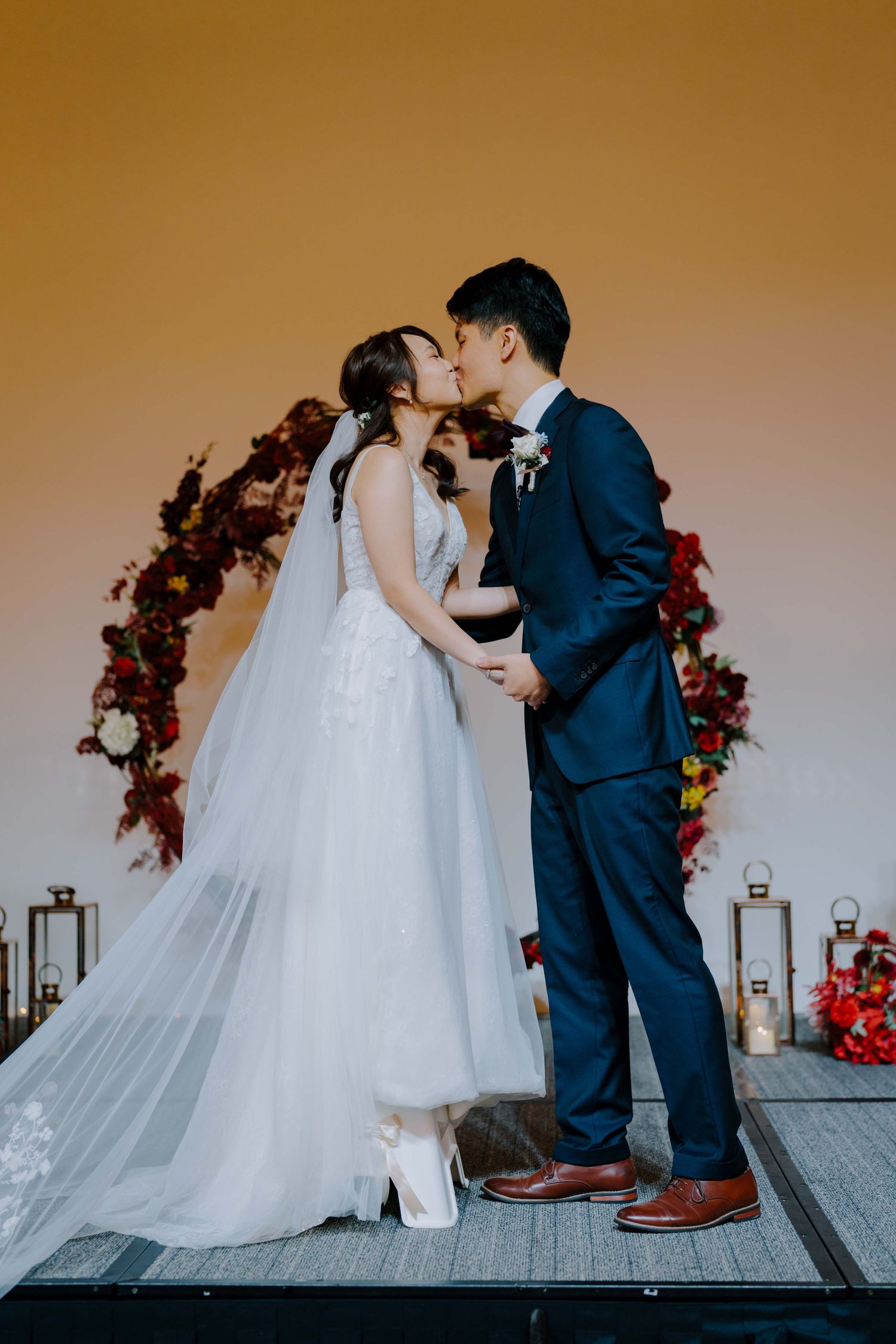bride and groom's first kiss
