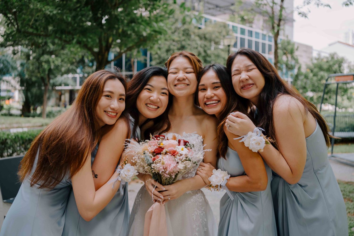 bridal party on wedding day at sofitel singapore city centre