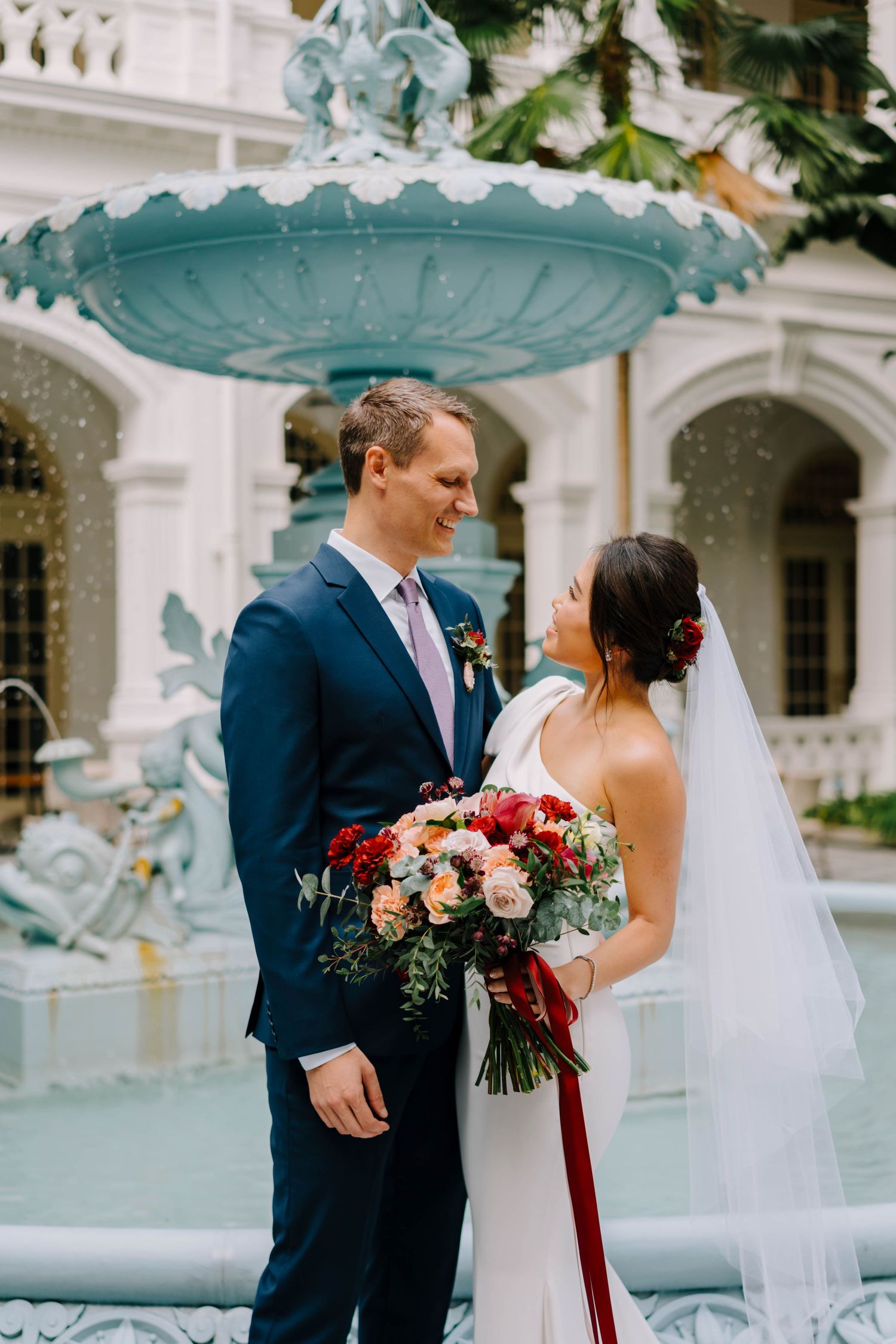 documentary-style wedding photograher at raffles hotel singapore