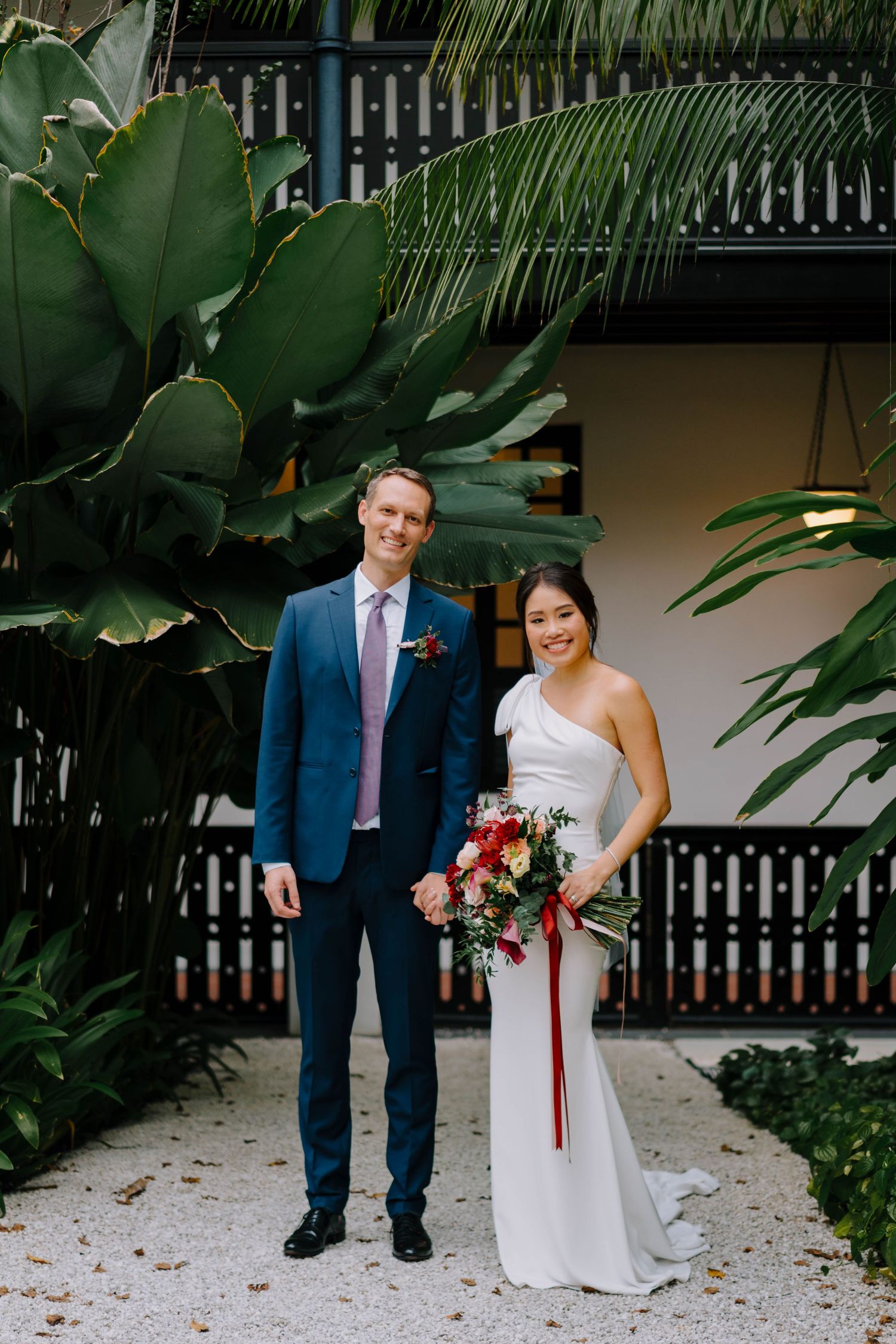 intimate and candid wedding photography at raffles hotel by a documentary-style wedding photographer