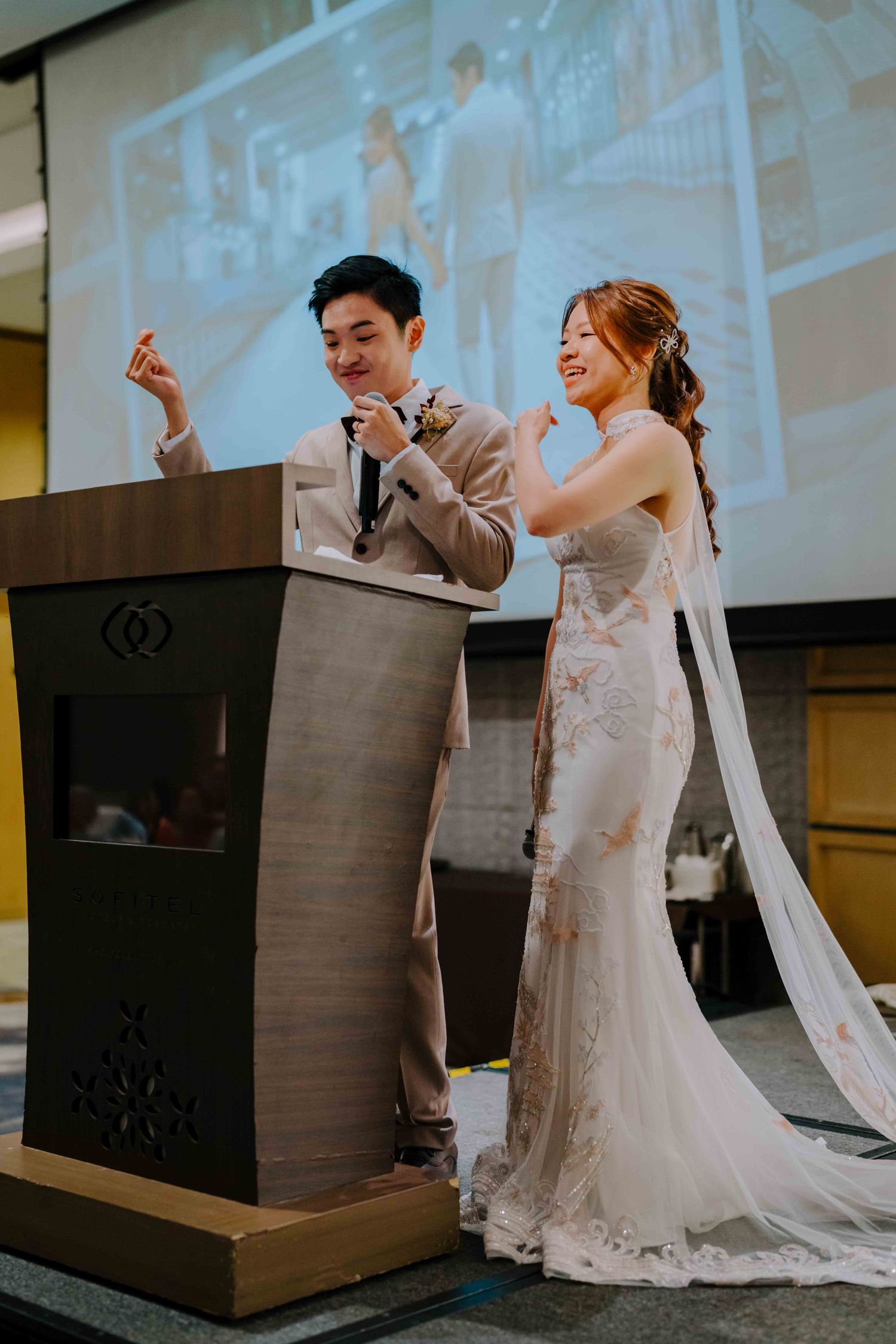 couple giving speech at sofitel singapore wallich street