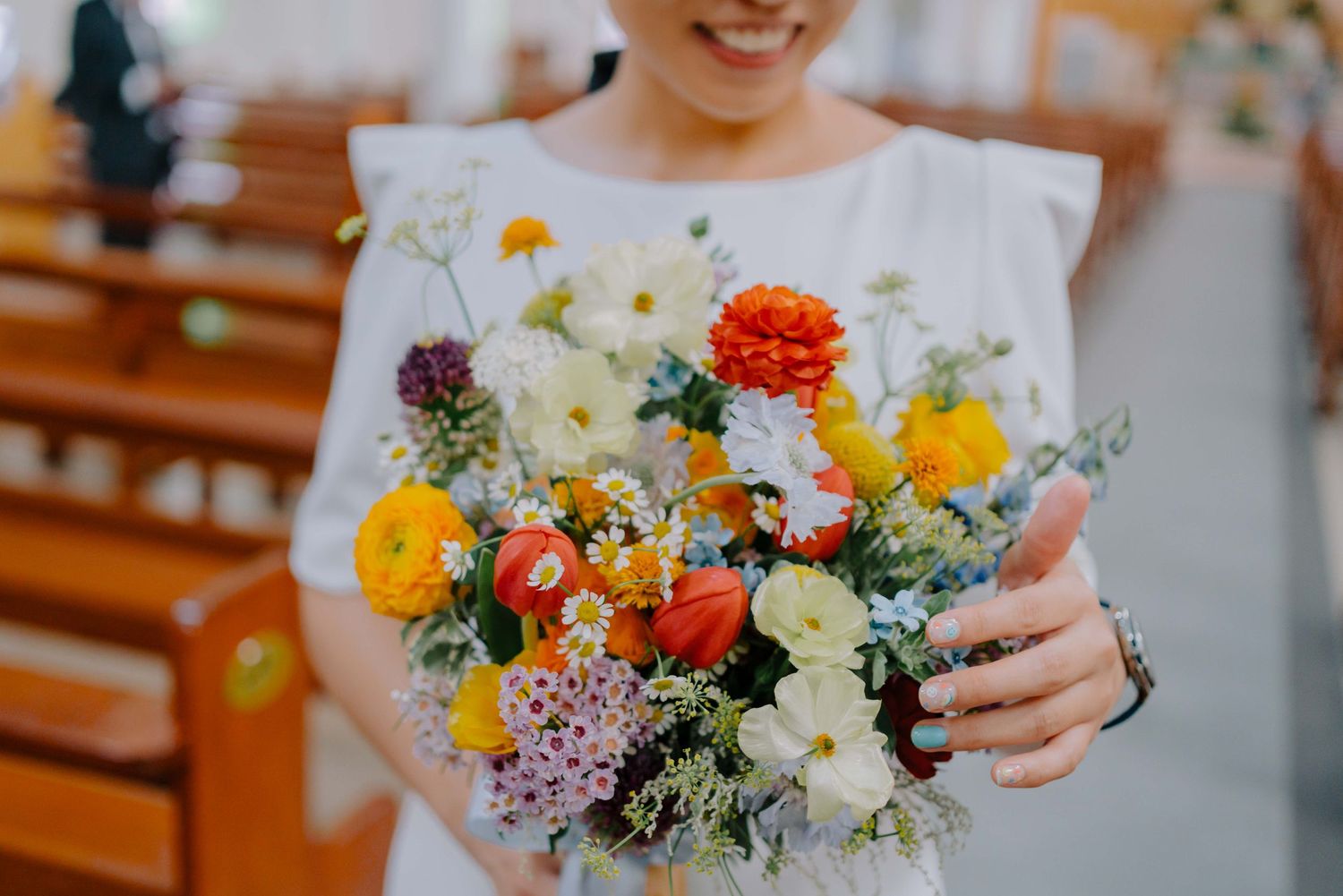 wedding bride holding bridal floral bouquet. shot by annopano