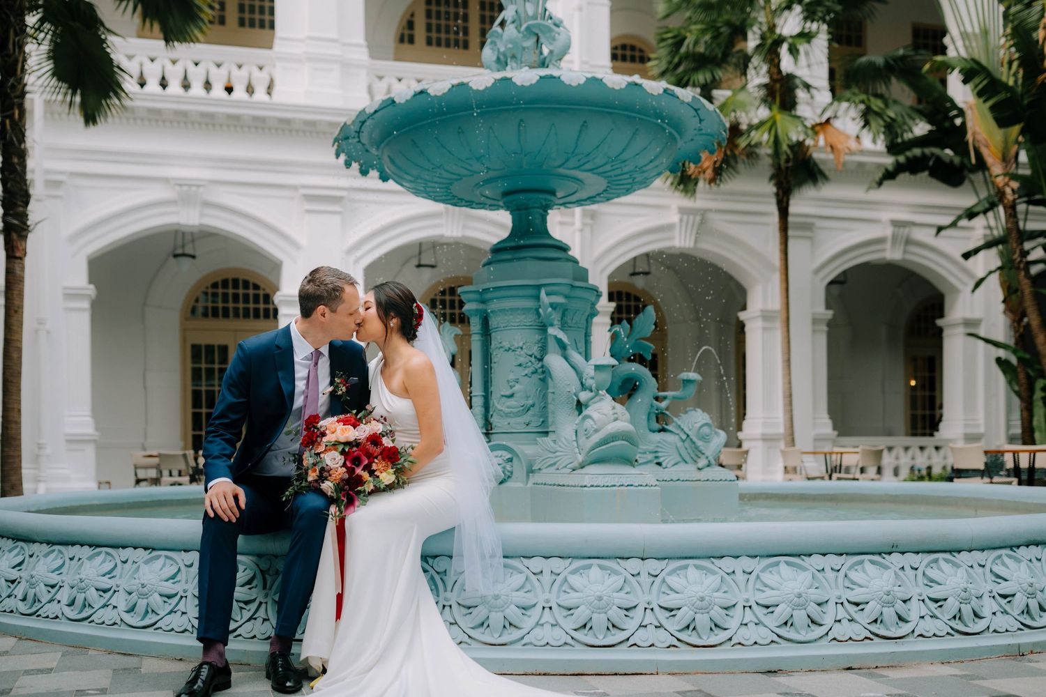 intimate and candid wedding photography at raffles hotel by a documentary-style wedding photographer