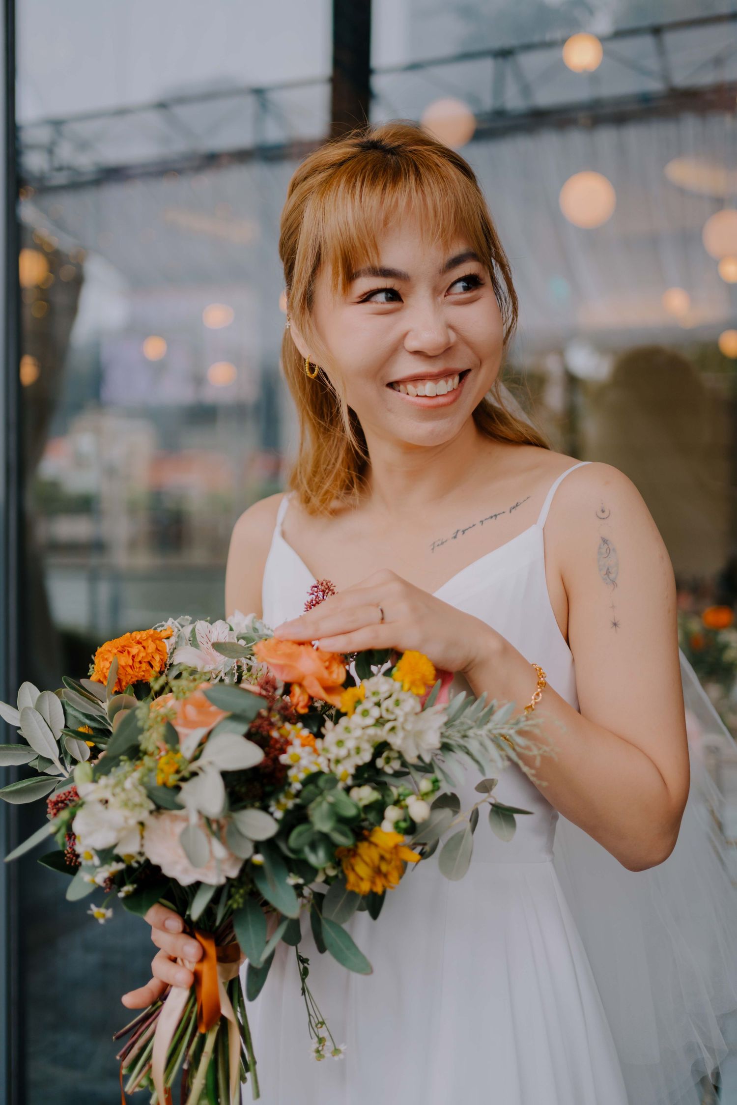 bride holding onto floral bouquet