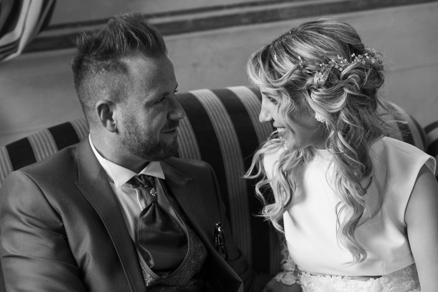 Black and white series of candid wedding couple moments.