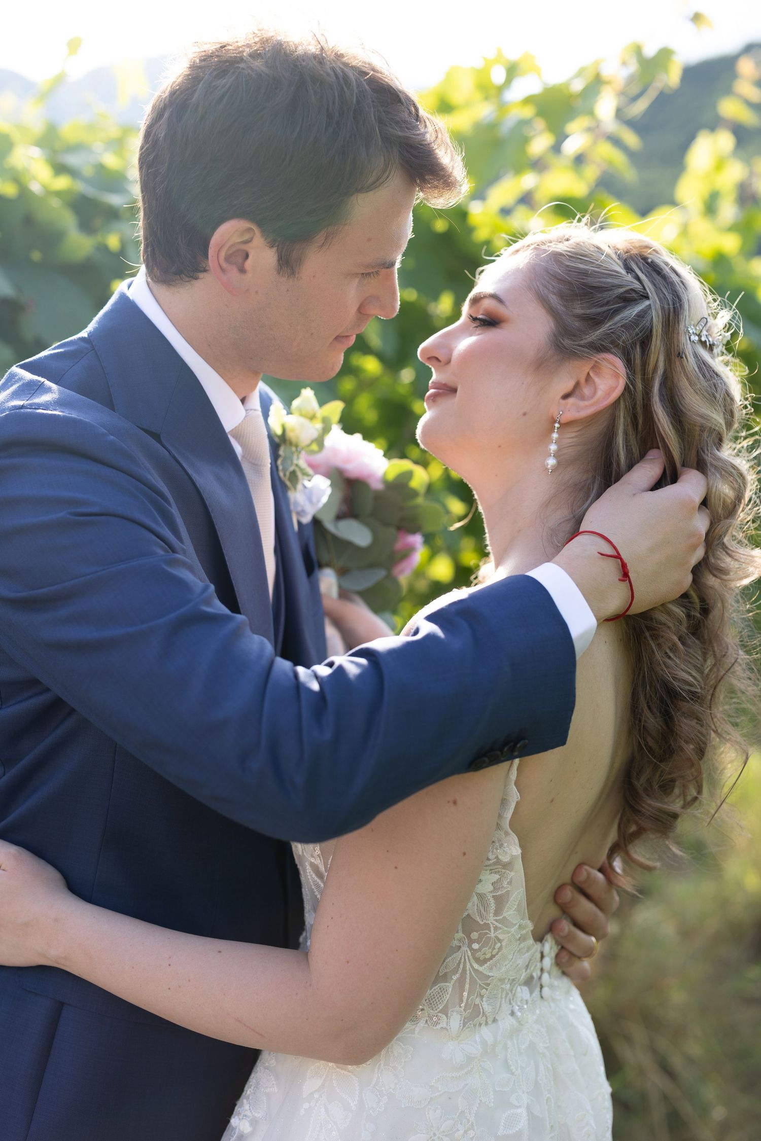 Romantic wedding couple sharing intimate kisses in a series of candid moments.