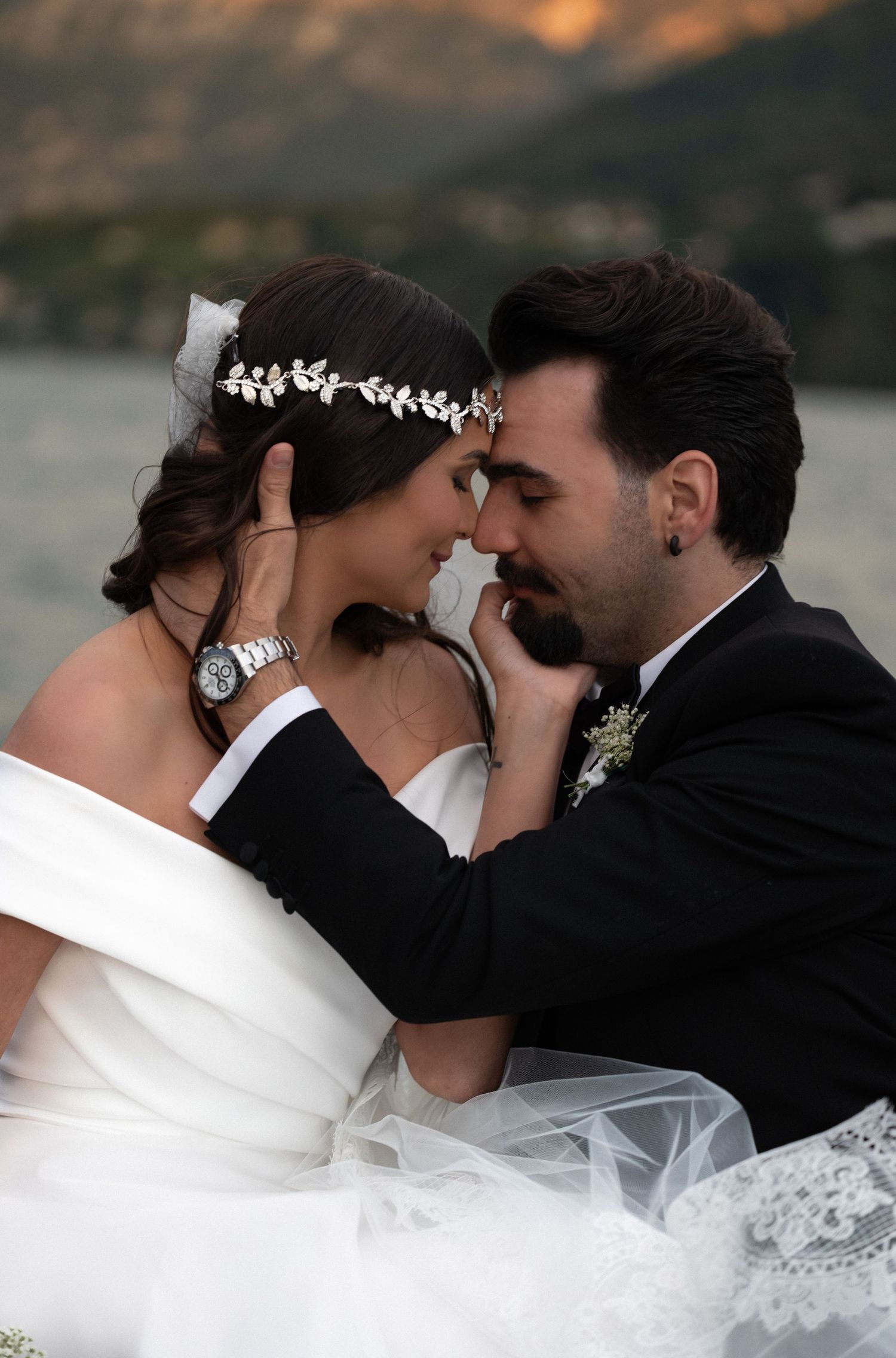 Romantic wedding couple sharing an intimate moment in a series of artistic black and white photographs.