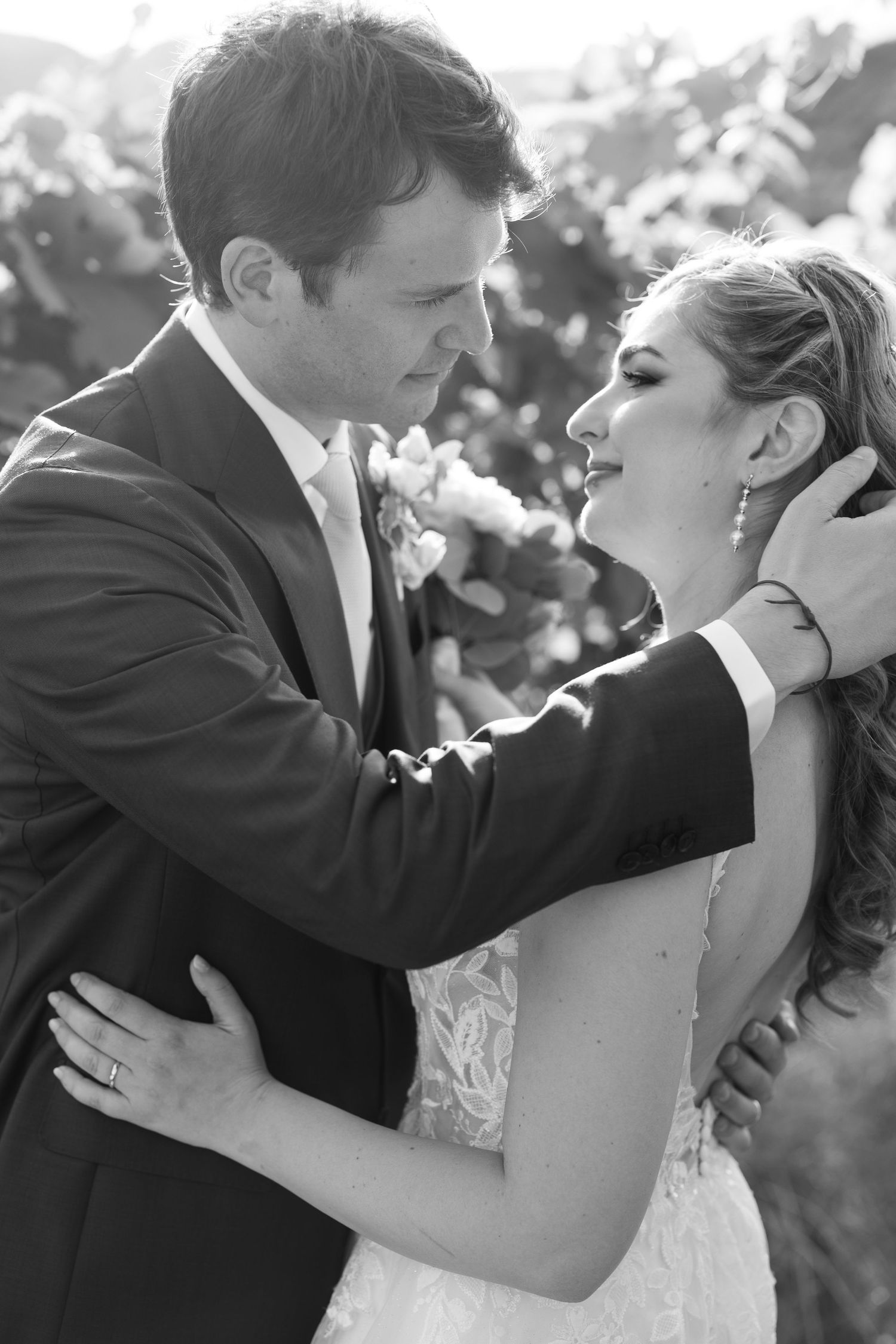 Intimate black and white sequence of romantic wedding couple moment.