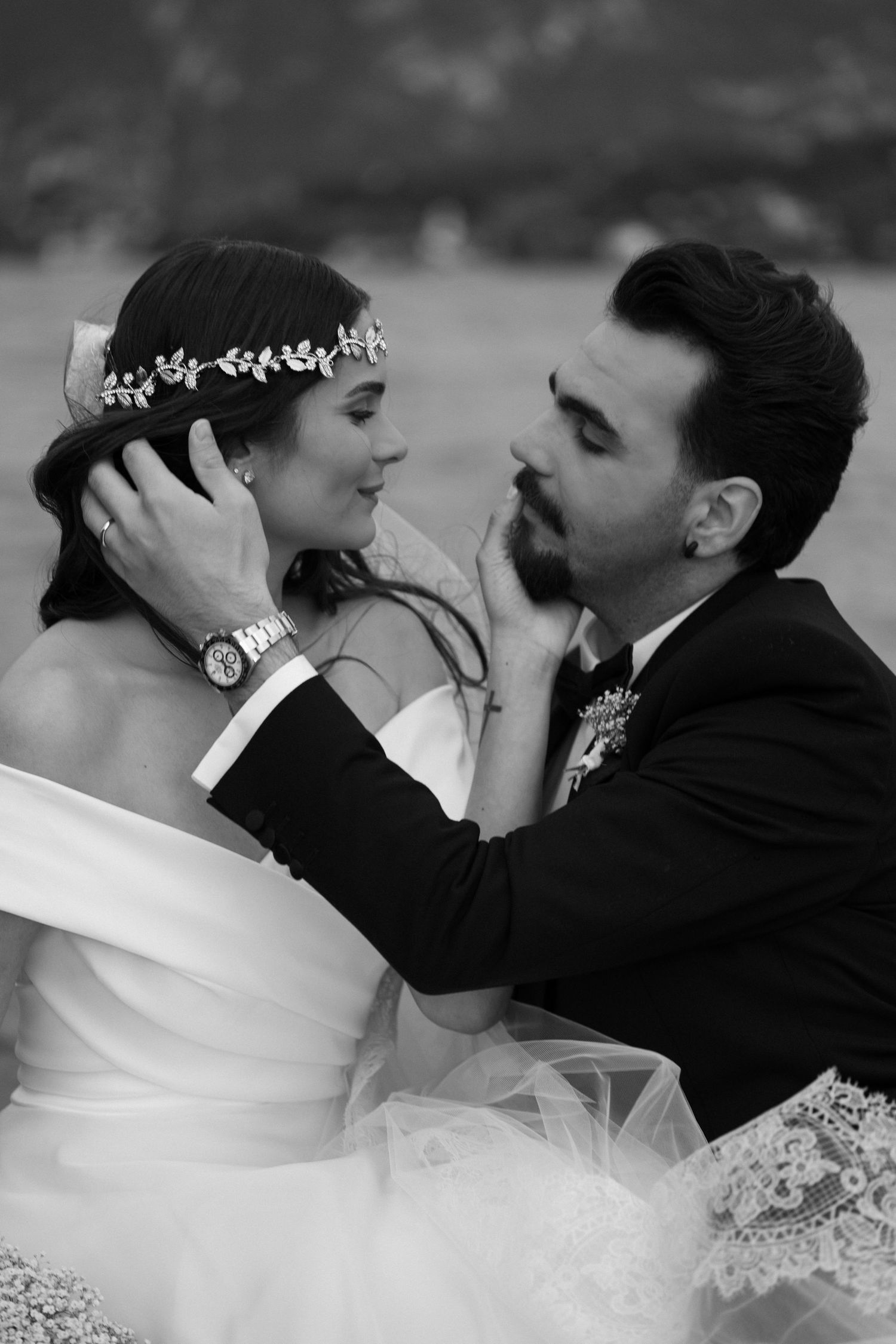 Artistic black and white sequence of newlyweds embracing during their wedding photoshoot.