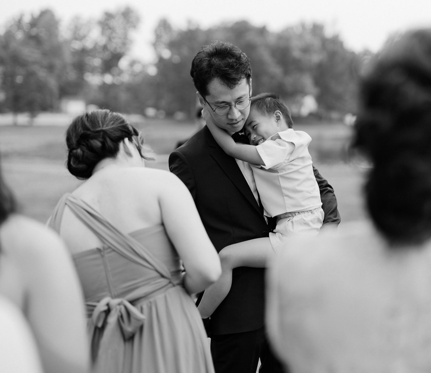 A romantic black and white photo sequence showing tender dance movements between two people.