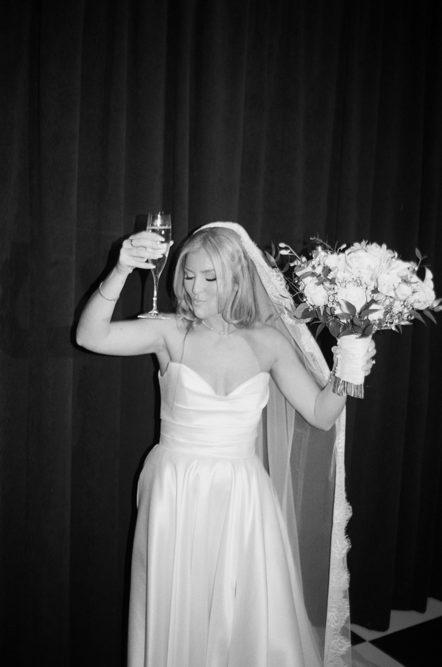 A sequence of black and white photos showing a bride in a white dress holding a bouquet in different poses.