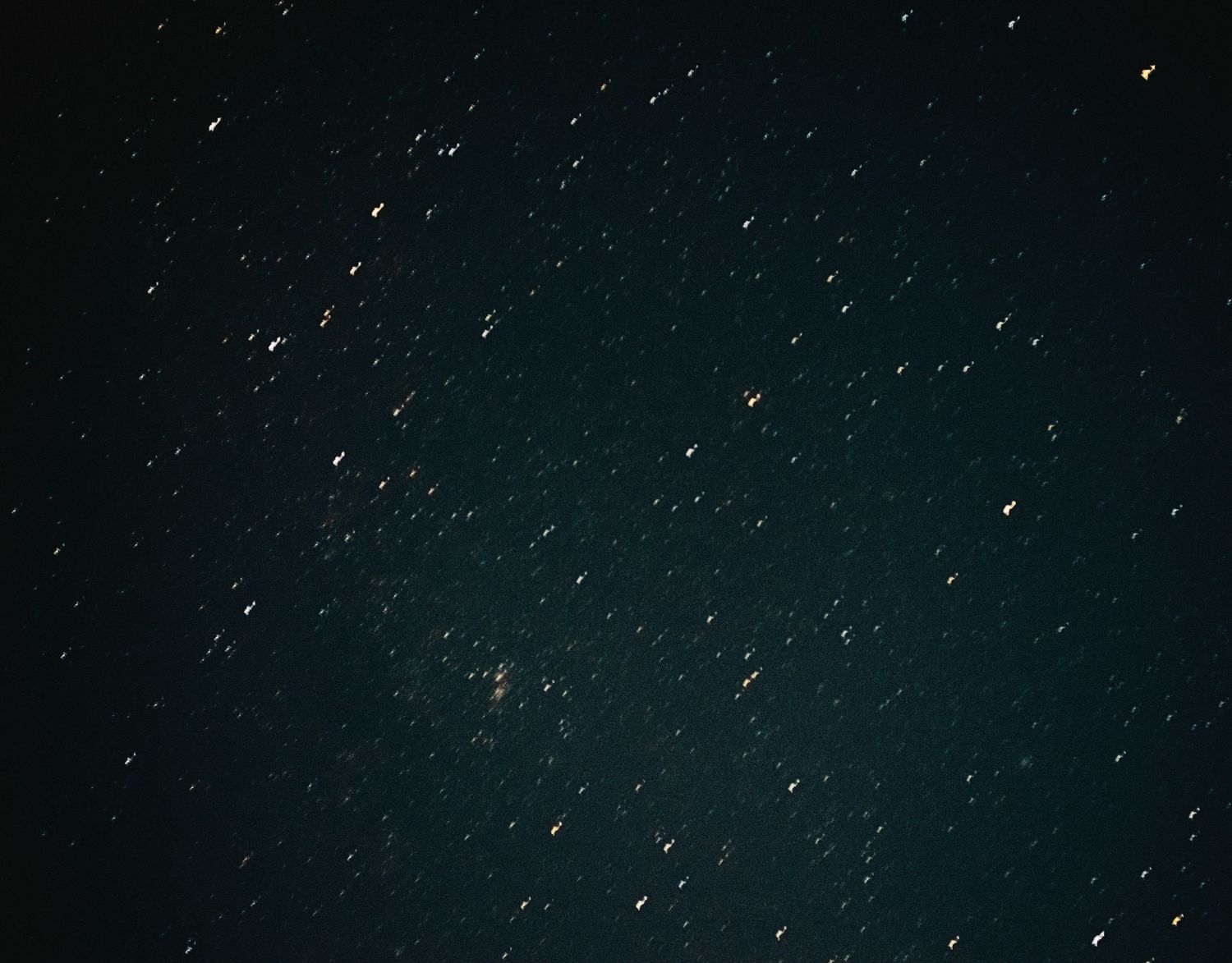 A beautiful starry night sky with twinkling stars scattered across the dark expanse of space.