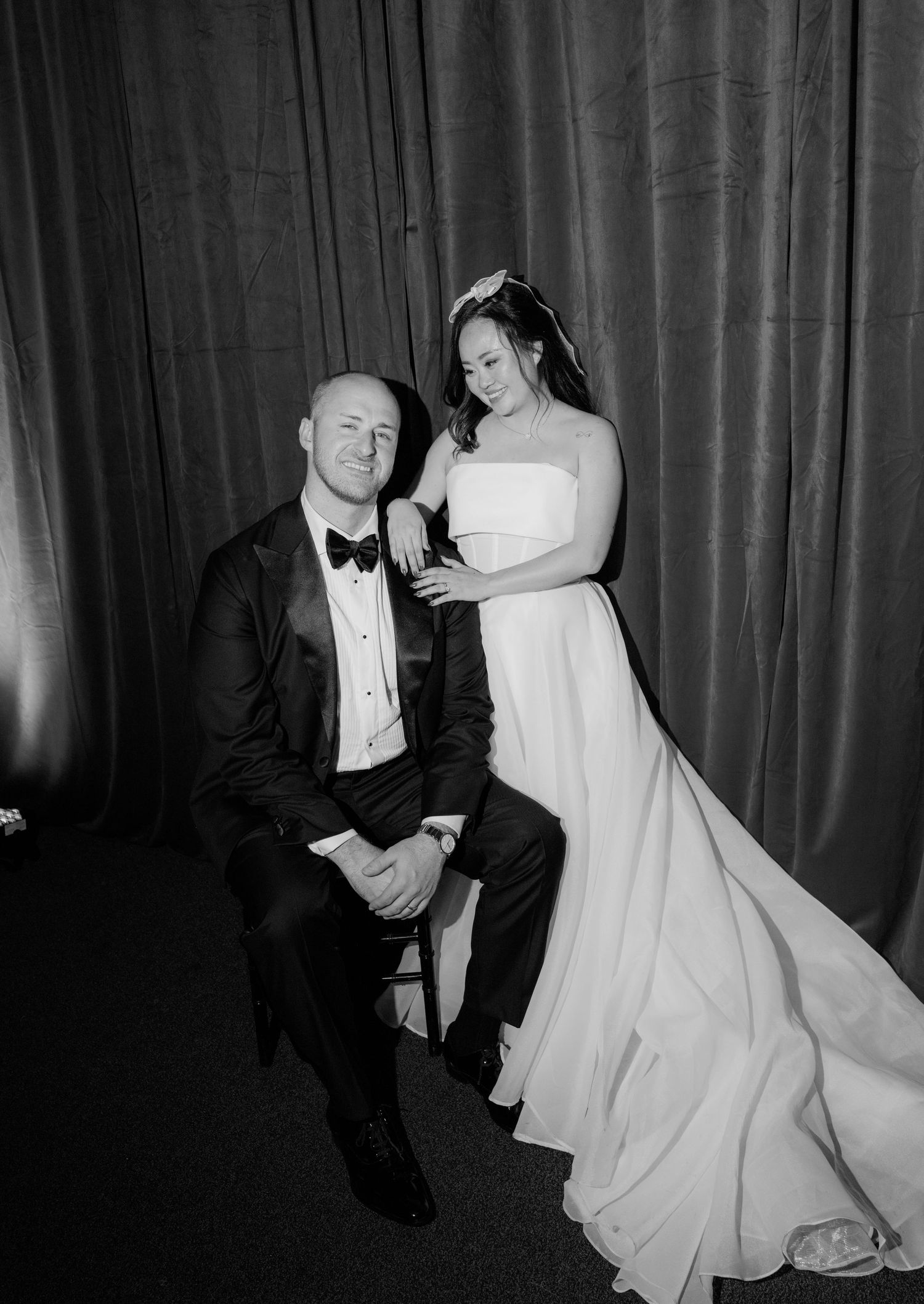 Black and white formal wedding photos showing elegant movement and classic style.