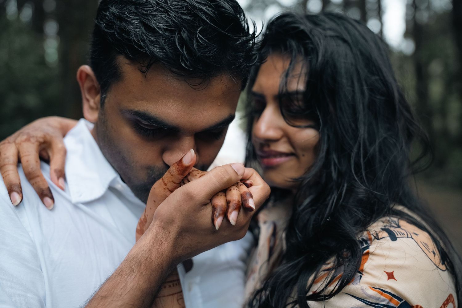 An intimate moment shared between two people during golden hour.