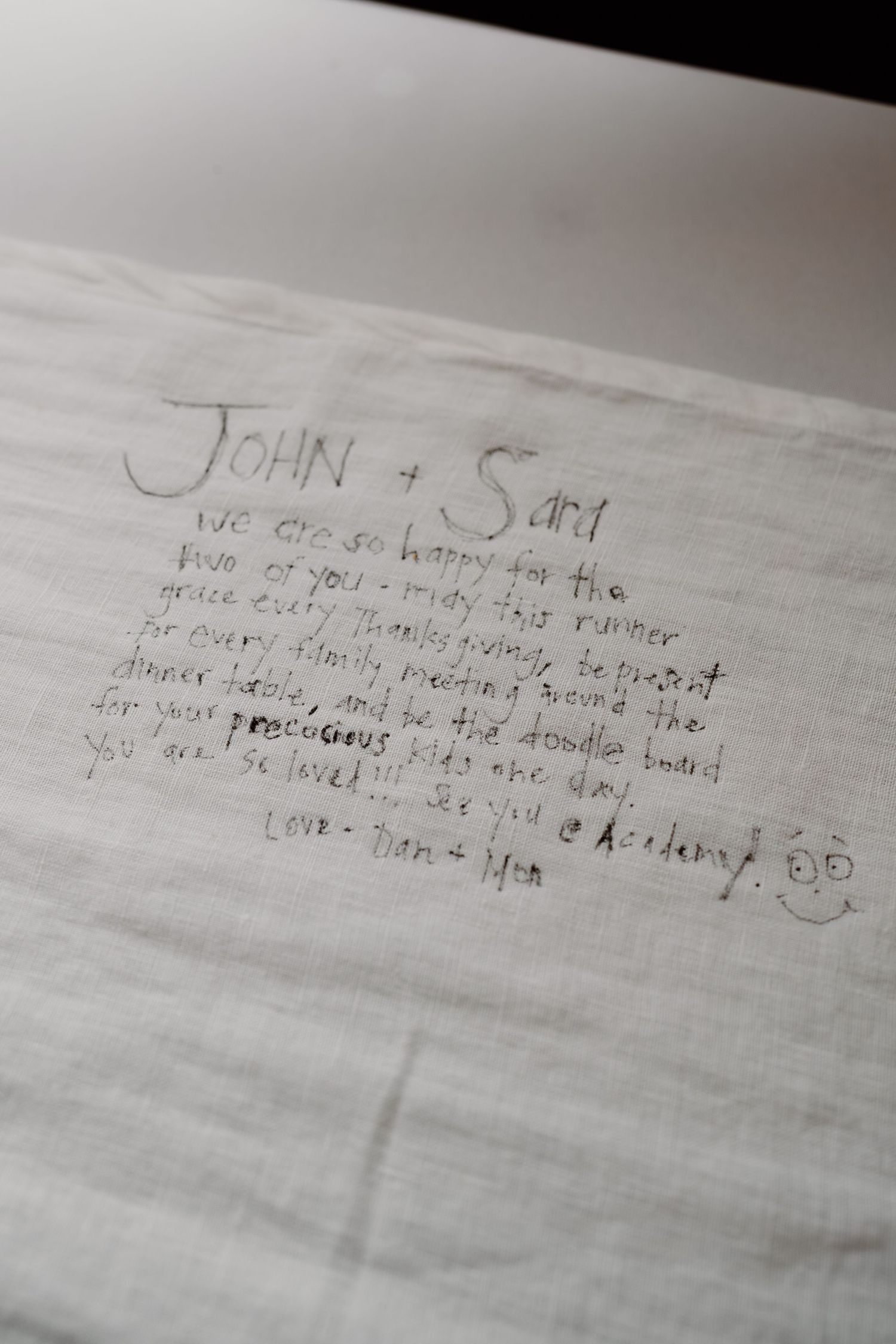 Handwritten note on white paper capturing a personal message.