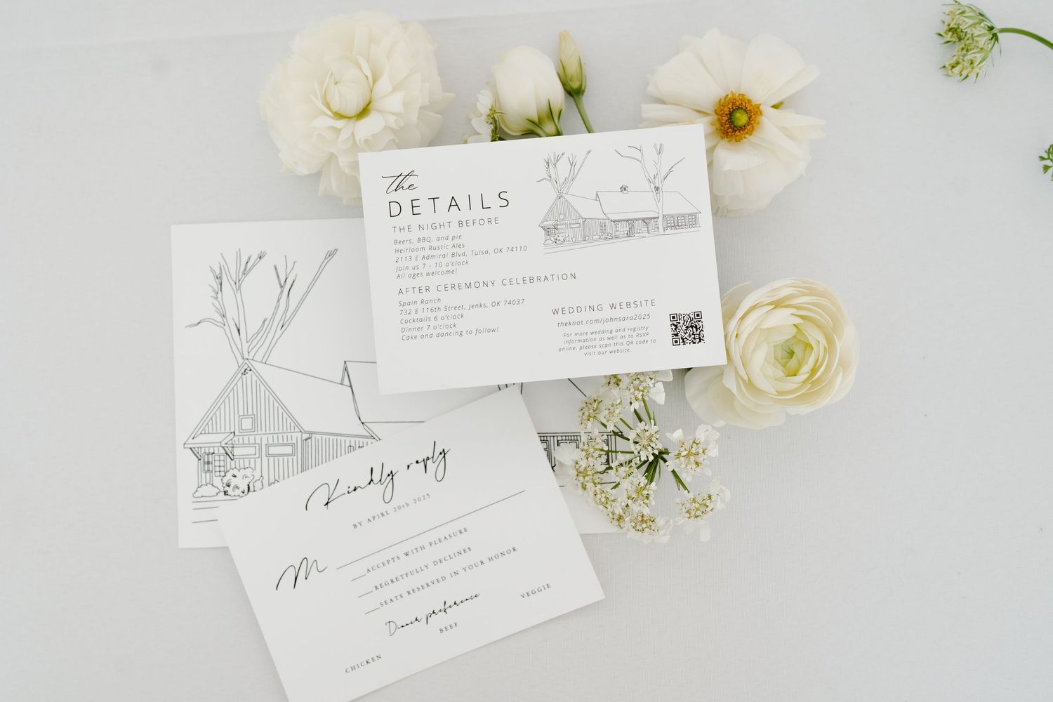 Wedding invitation details with white roses and delicate floral arrangements.