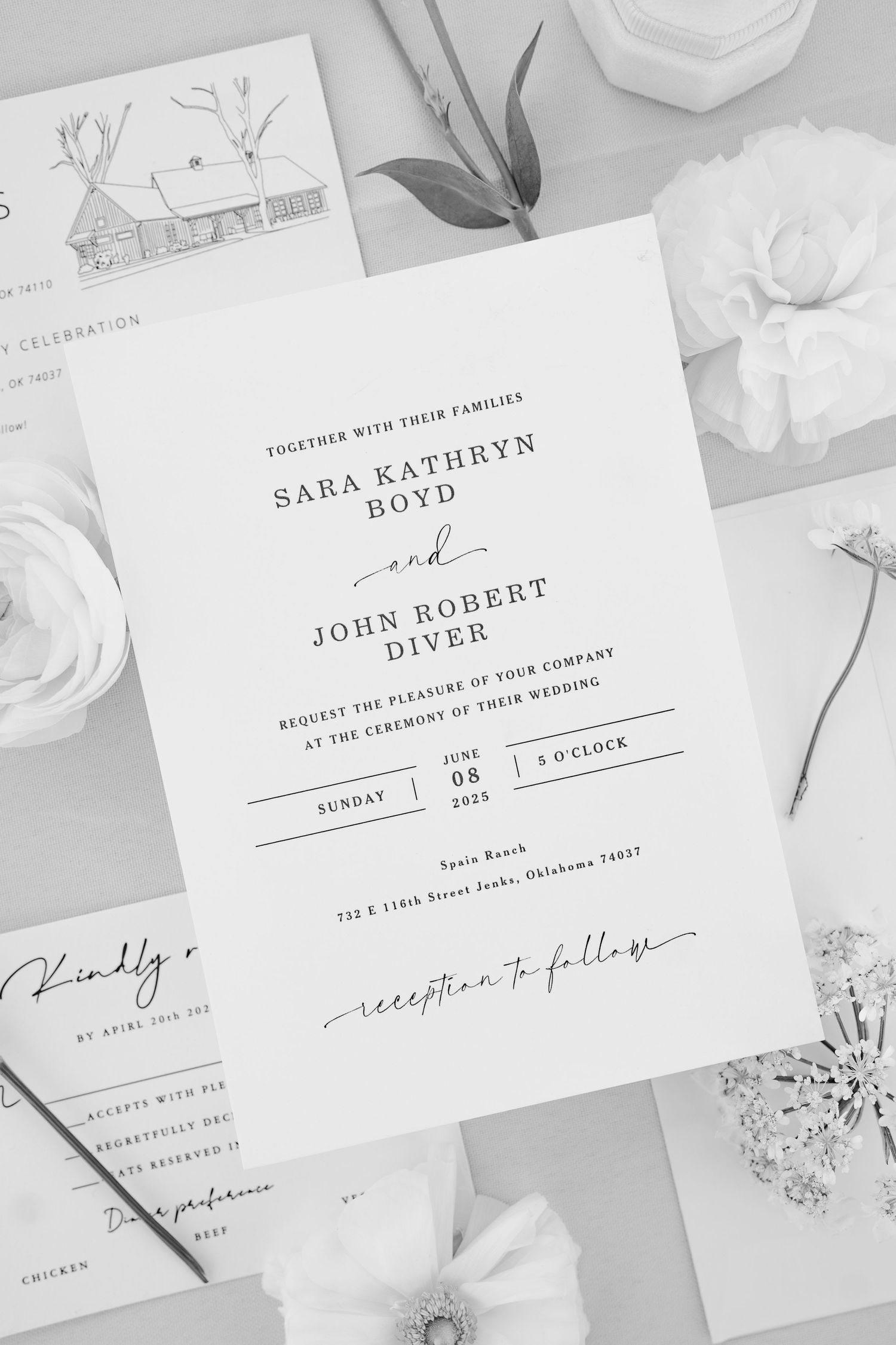 Black and white wedding invitation design with classic typography and floral elements.