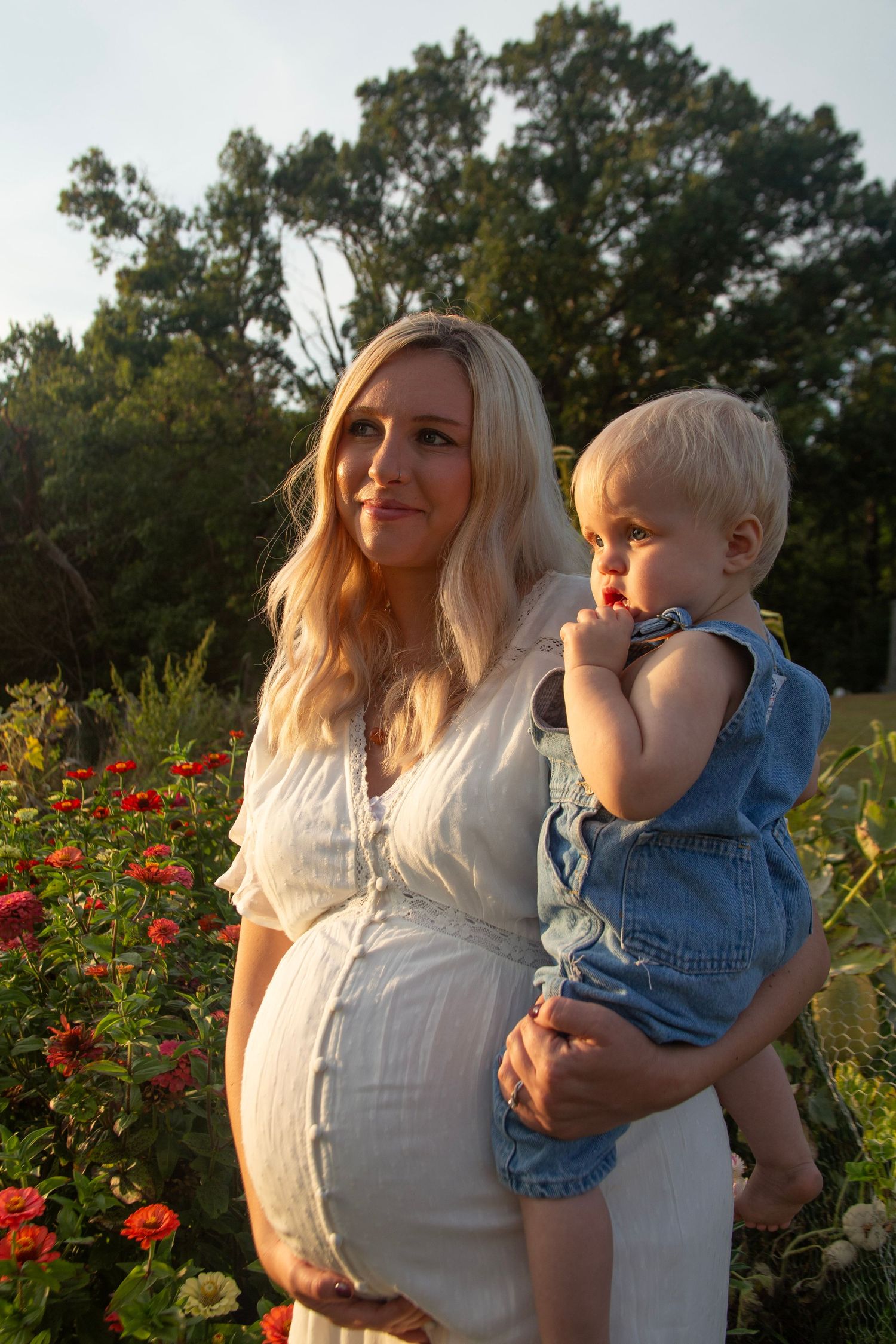 Maternity photos with mom and son in mom's garden, backyard family photos, Emily Earll Photos