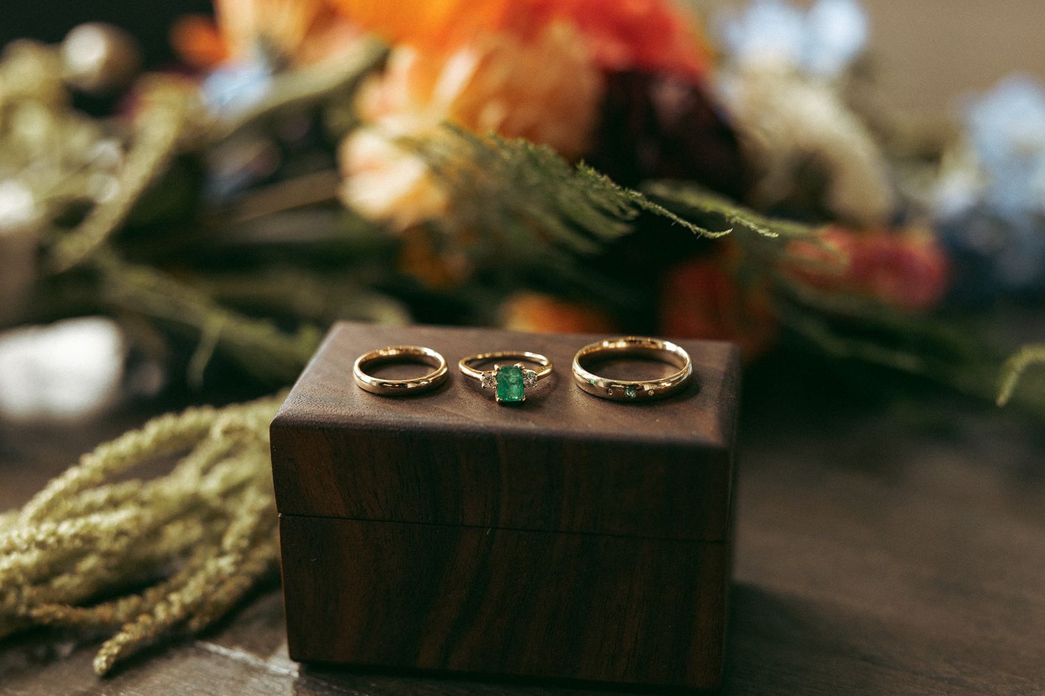 Emily and Noah's Wedding the the Emerald ring and imbedded Groom's ring by Thomas and Co. Photography