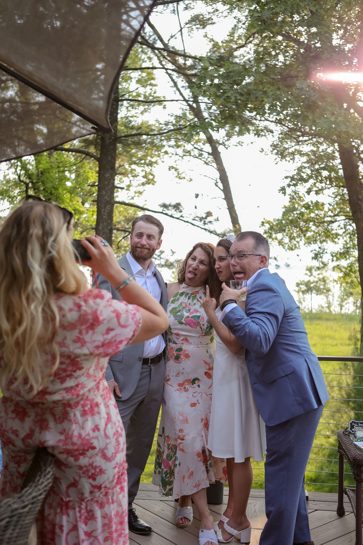 Backyard wedding goofy family photos, natural family photos, Emily Earll Photos