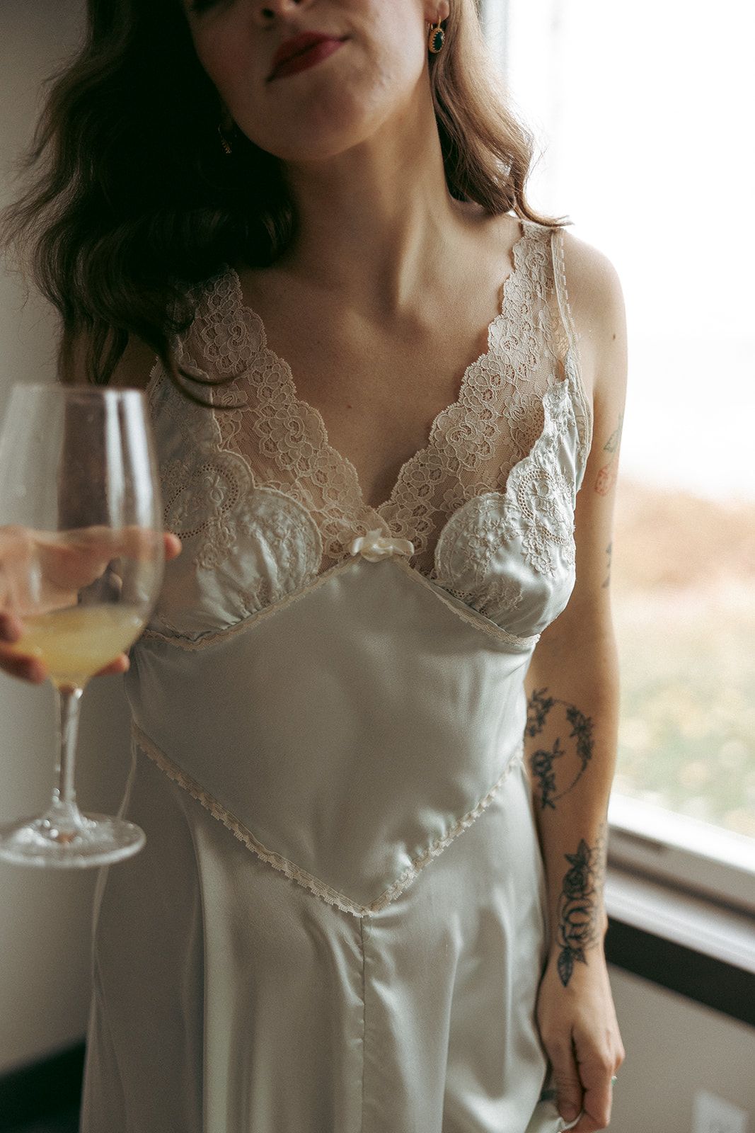 Emily and Noah's Wedding the bride wore a blue vintage Victoria secret  slip dress to get ready in by Thomas and Co. Photography