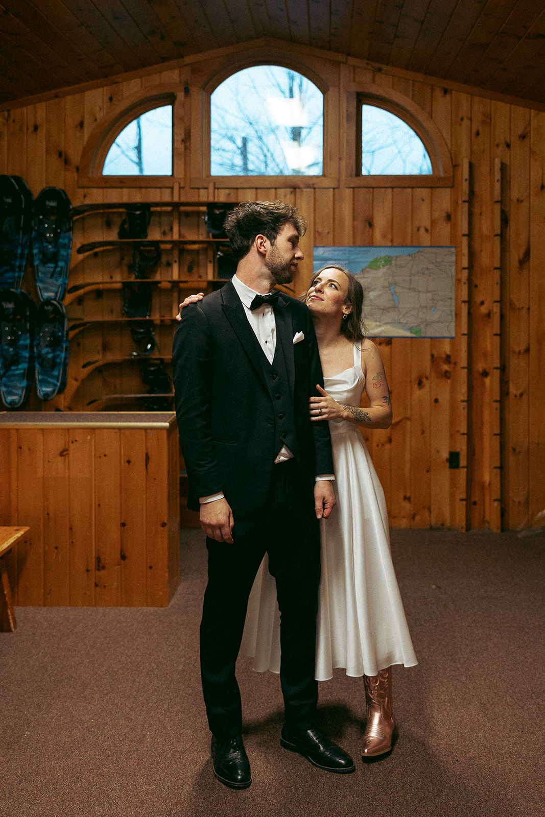 Emily and Noah's Wedding the bride and groom featuring the cowboy boots by Thomas and Co. Photography